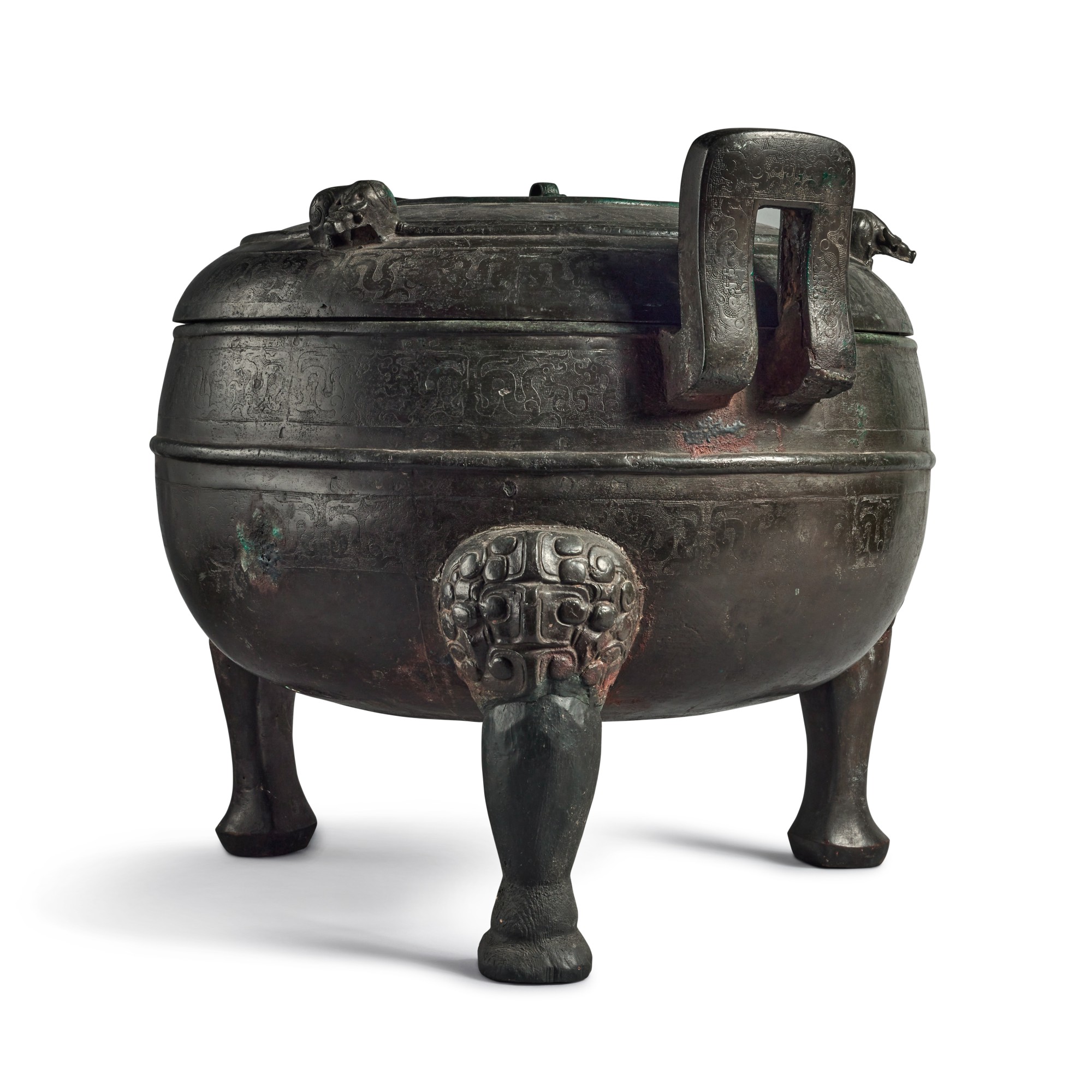 A massive archaic bronze ritual food vessel and cover (Ding), Early ...