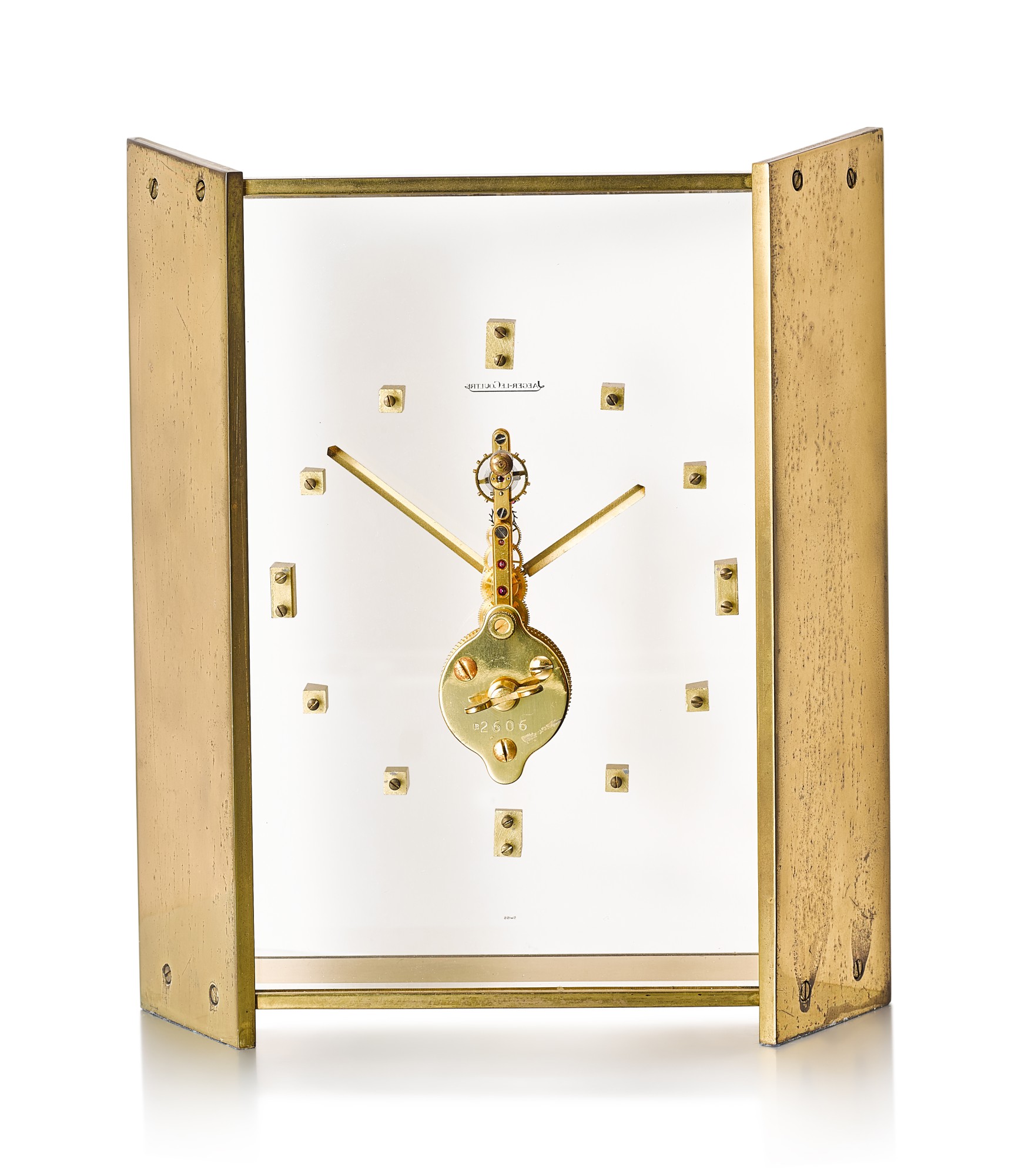JAEGERLECOULTRE A GILT BRASS TABLE CLOCK WITH 8 DAYS POWER RESERVE