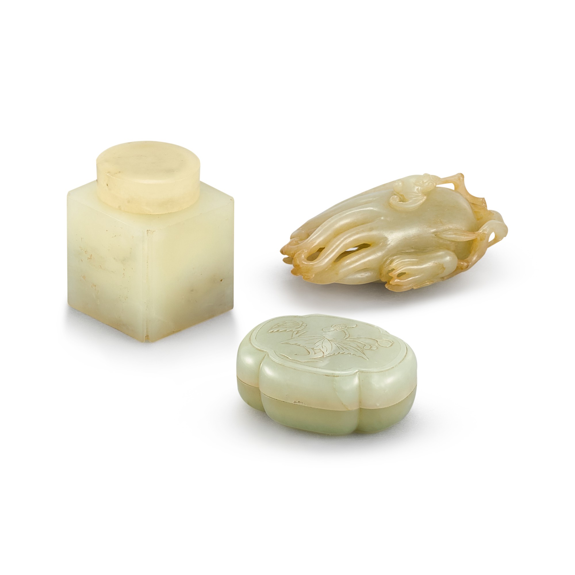 A PALE GREEN JADE CARVING OF A FINGER CITRON AND TWO PALE GREEN JADE