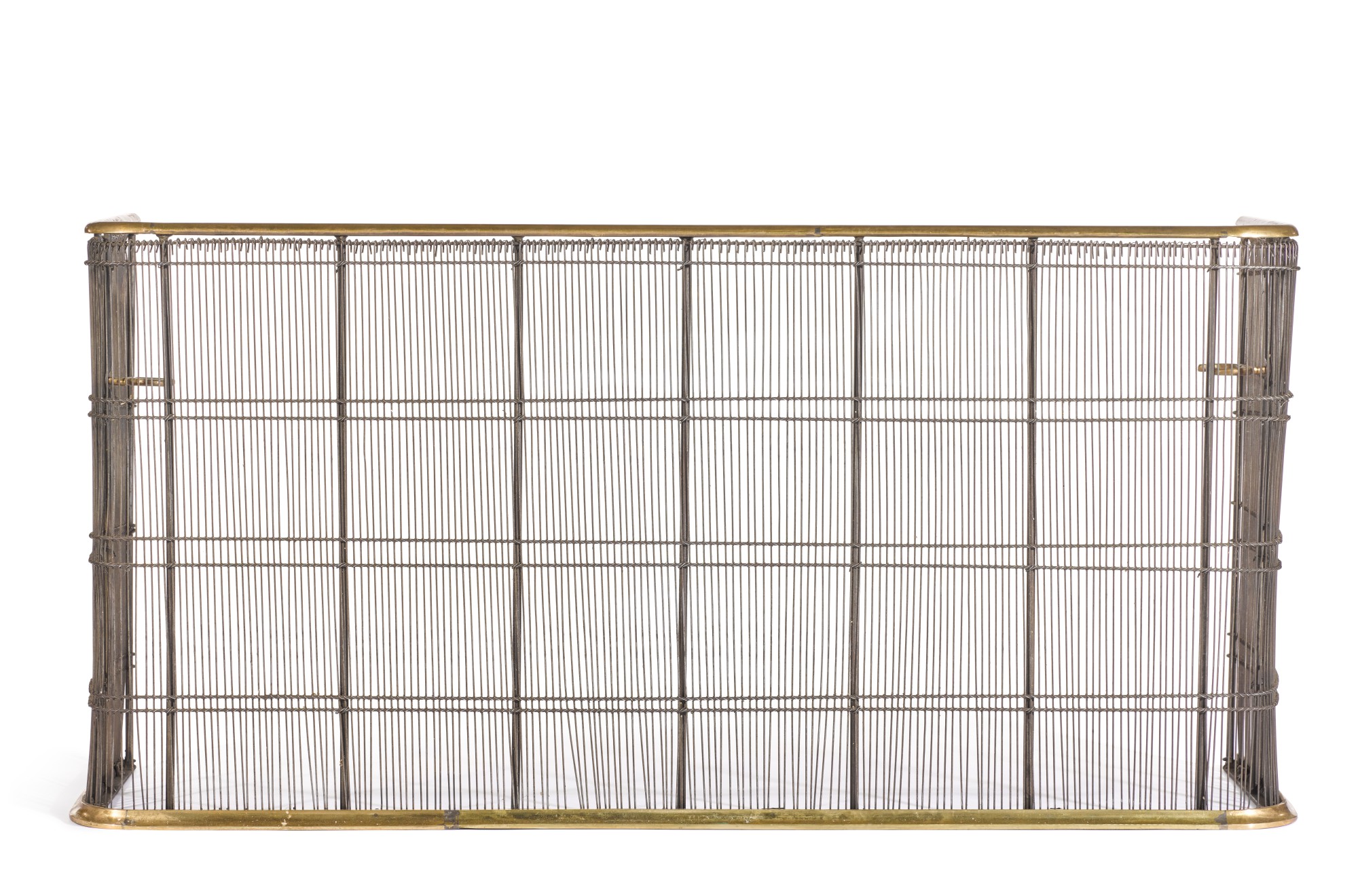 A BRASS AND WIRE MESH NURSERY FENDER BY JAMB, MODERN COPY AFTER A