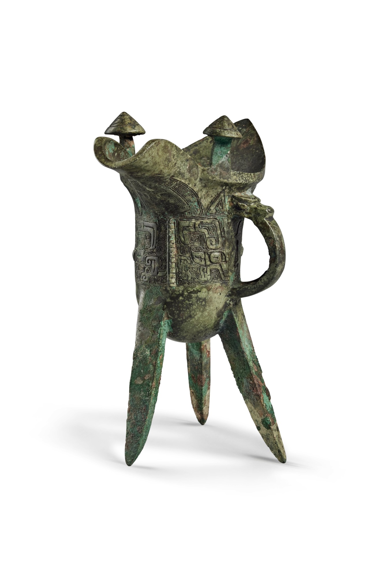 An inscribed archaic bronze ritual wine vessel (Jue), Late Shang ...