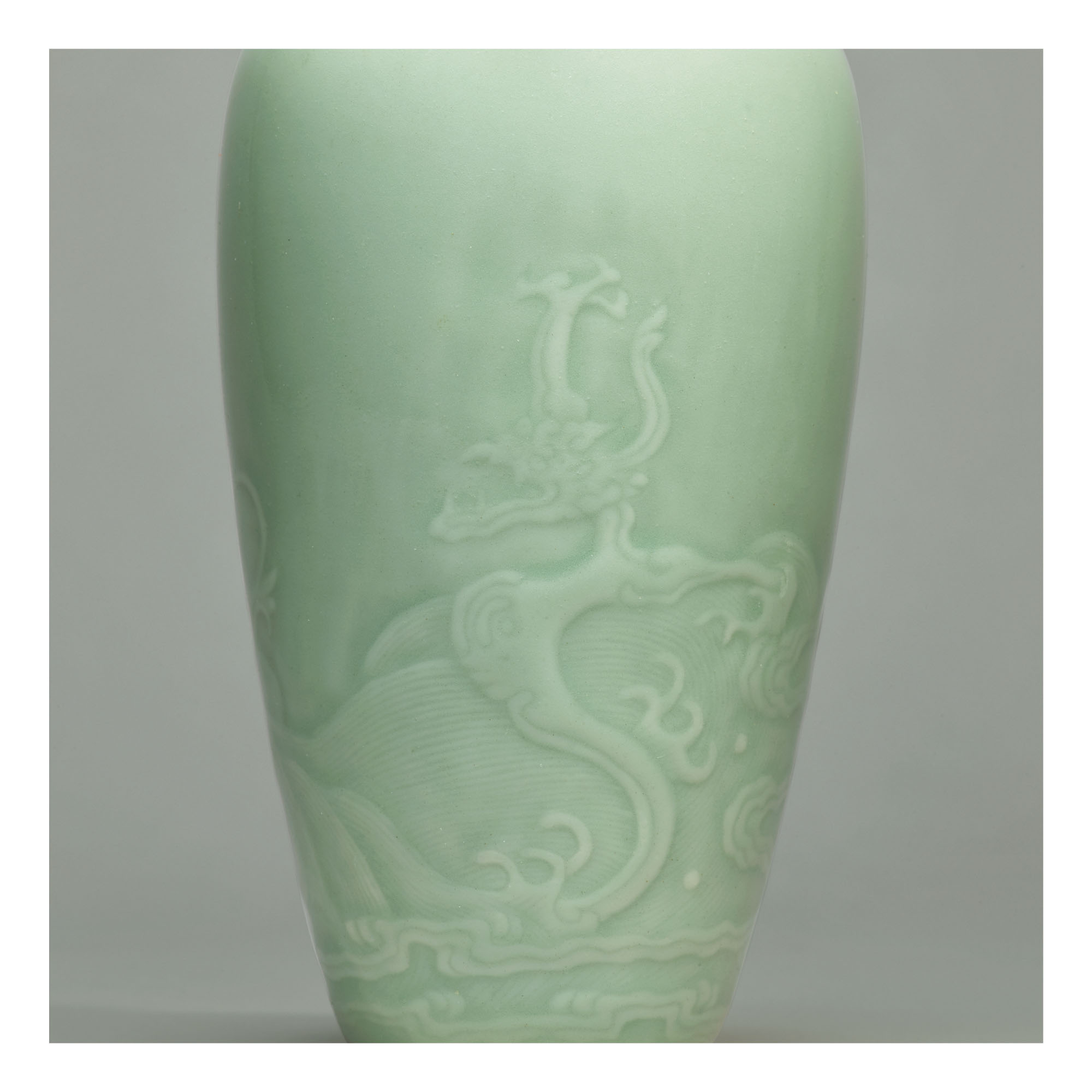 A RARE CELADONGLAZED 'DRAGON' AMPHORA VASE, KANGXI MARK AND PERIOD
