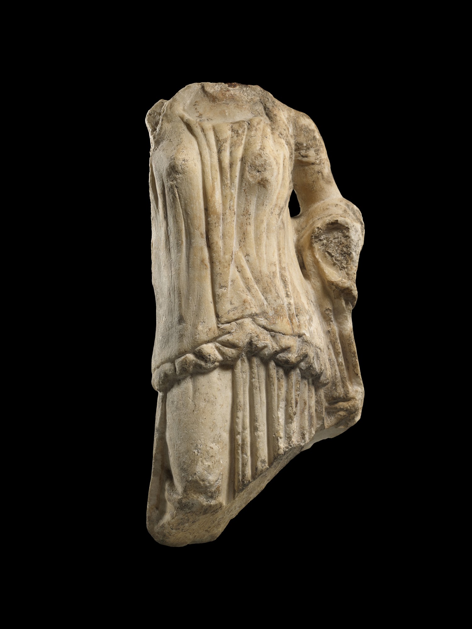 A GREEK MARBLE TORSO OF A GODDESS, 1ST HALF OF THE 4TH CENTURY B.C