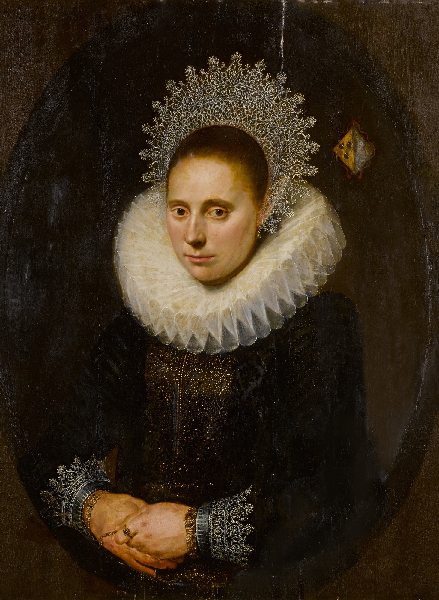 Portrait of a woman wearing a fanshaped headdress, threequarter