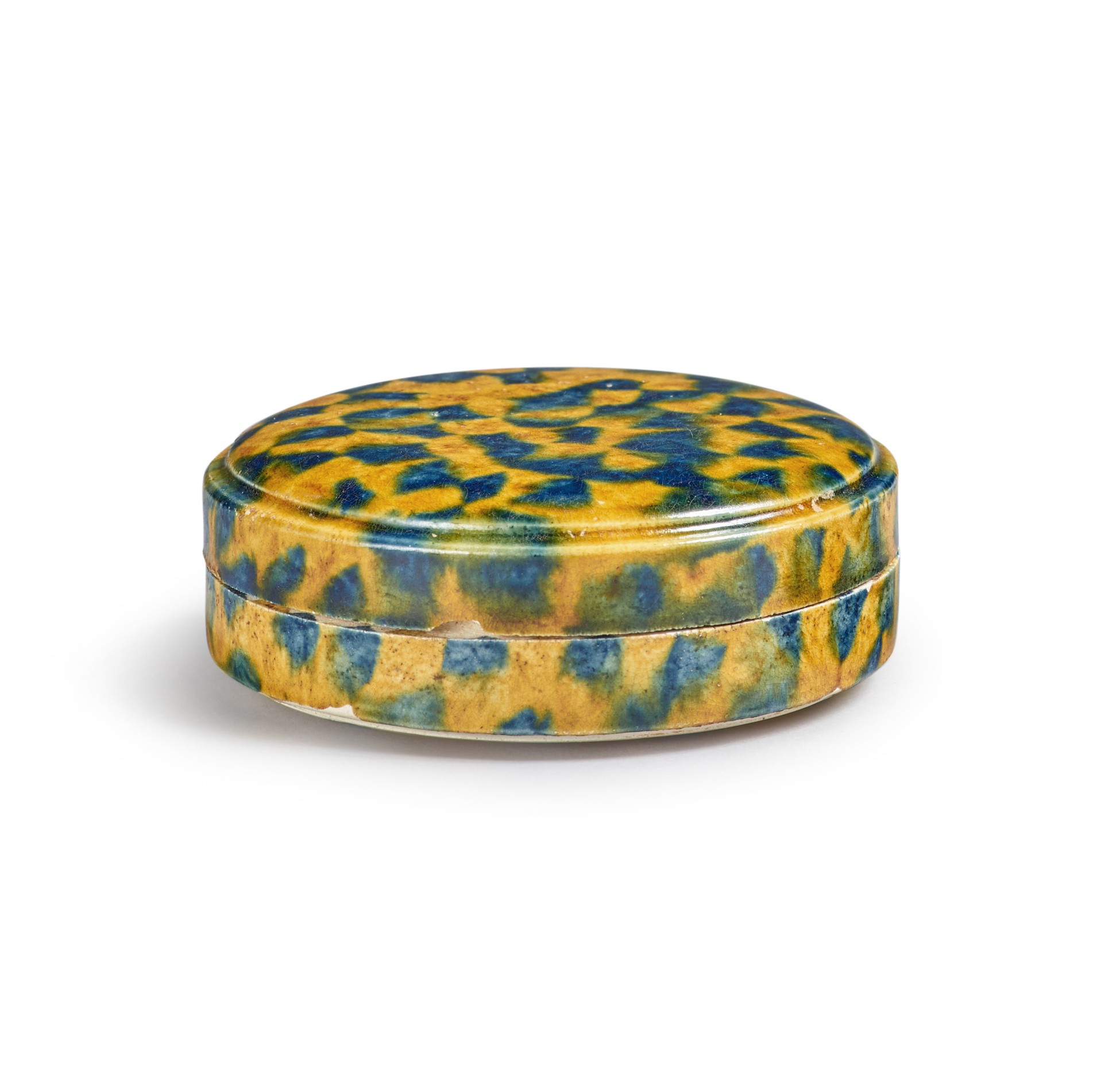 A dappled blueandamberglazed box and cover, Tang dynasty 唐 三彩加藍蓋盒