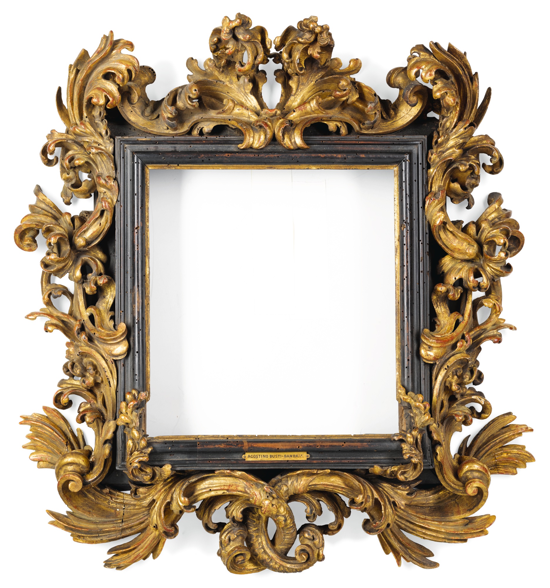 A NORTH ITALIAN BAROQUE CARVED GILTWOOD PICTURE FRAME IN THE MANNER OF 