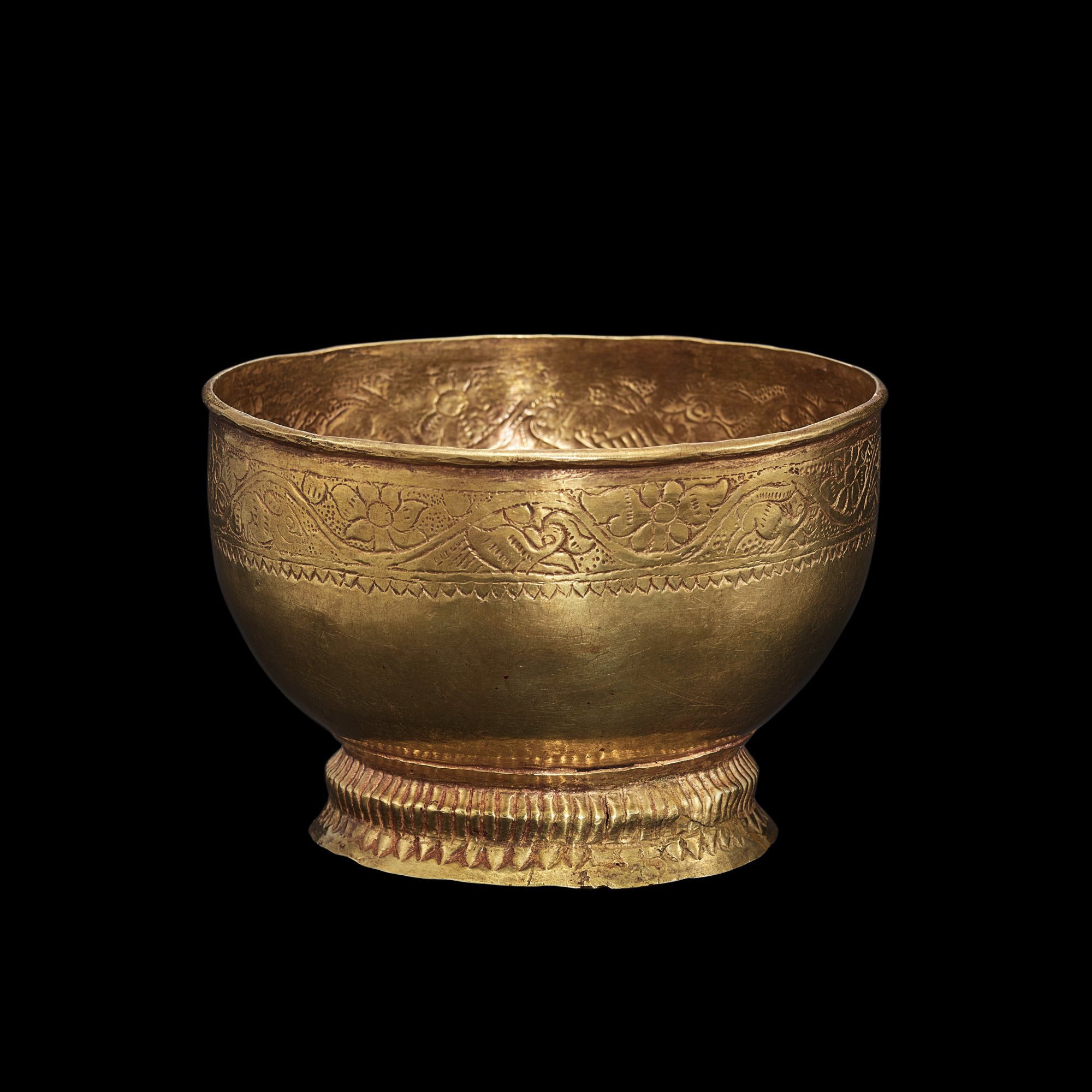 A chiseled gold bowl with lotus flower and animals Khmer, 7th 12th