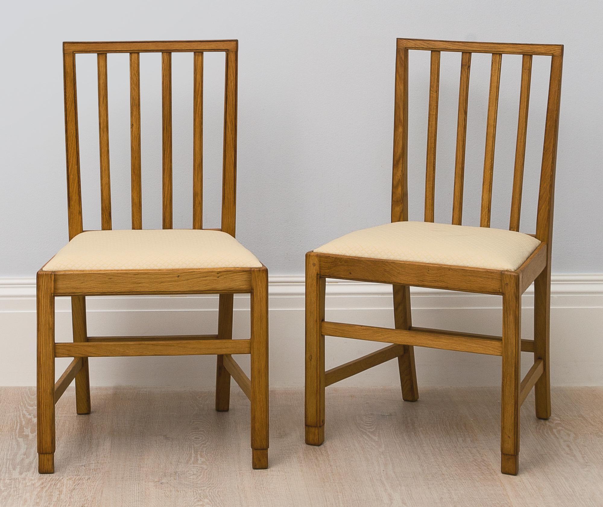 EDWARD BARNSLEY SET OF TEN CHAIRS AND TWO ARMCHAIRS Made in Britain 2020 Sotheby's