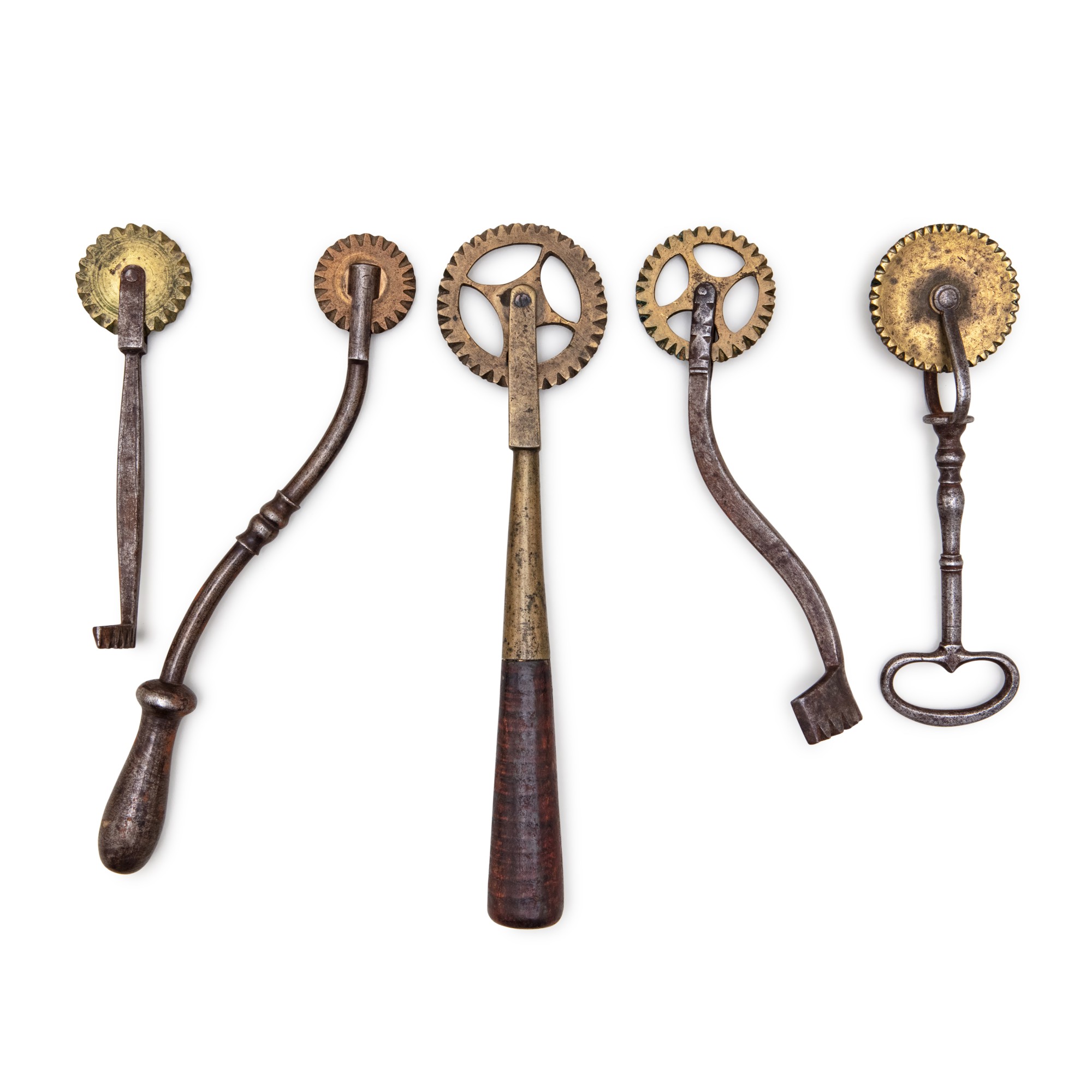 Group of Five Cast Brass and Wrought Iron Jagging Wheels, Southeastern