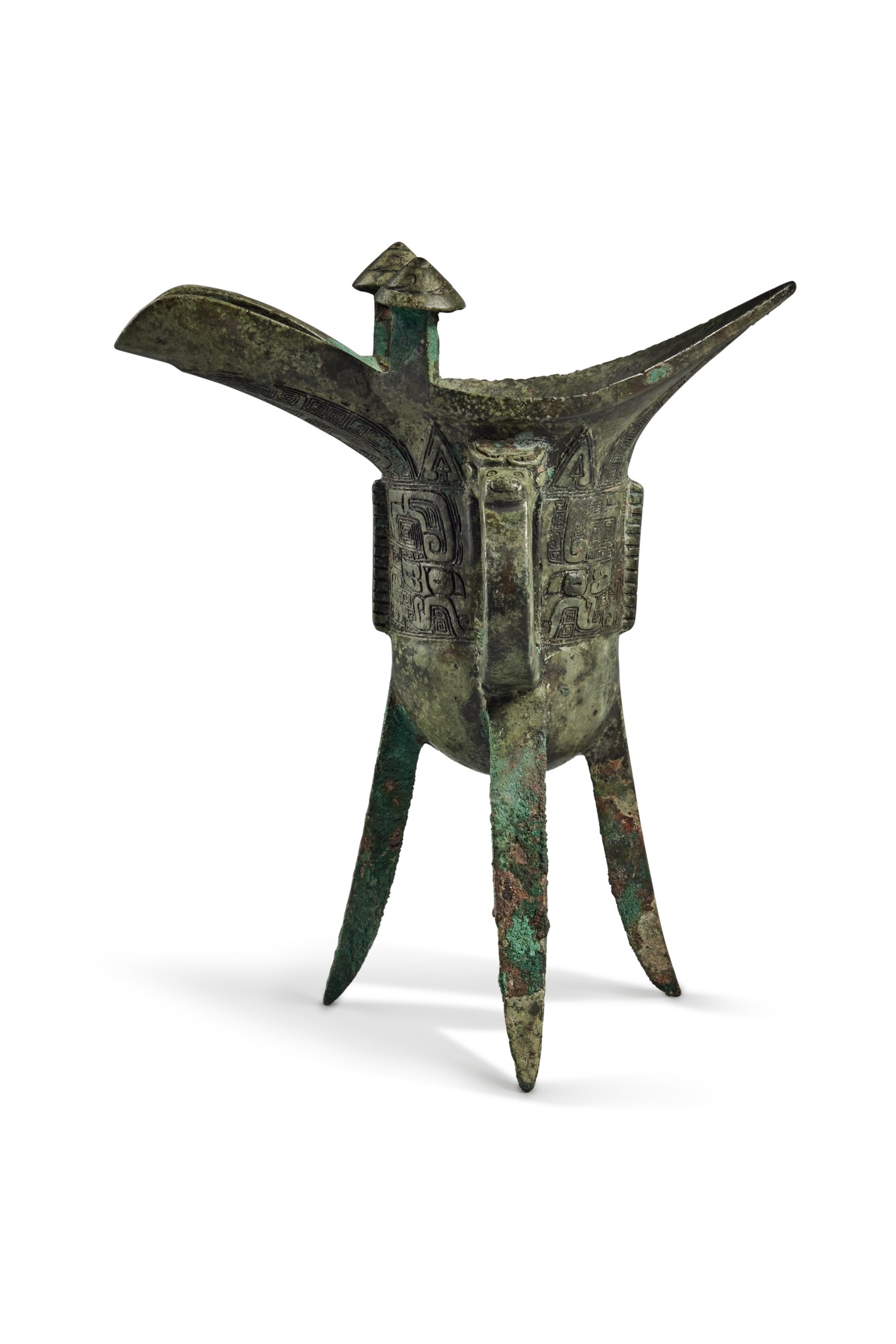 An inscribed archaic bronze ritual wine vessel (Jue), Late Shang ...