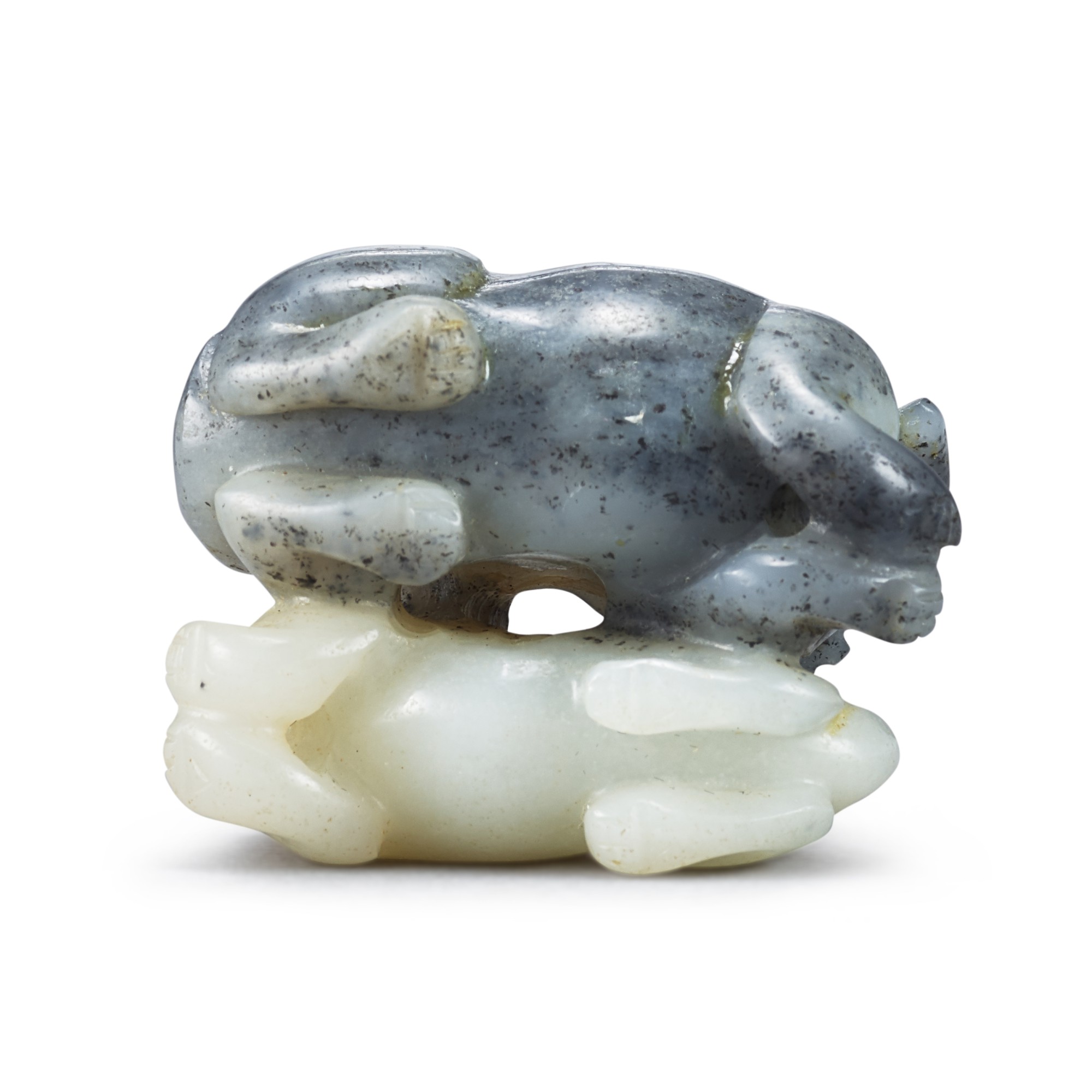 A black and white jade 'dogs' group, Qing dynasty 清 墨白玉巧雕雙犬 CHINA