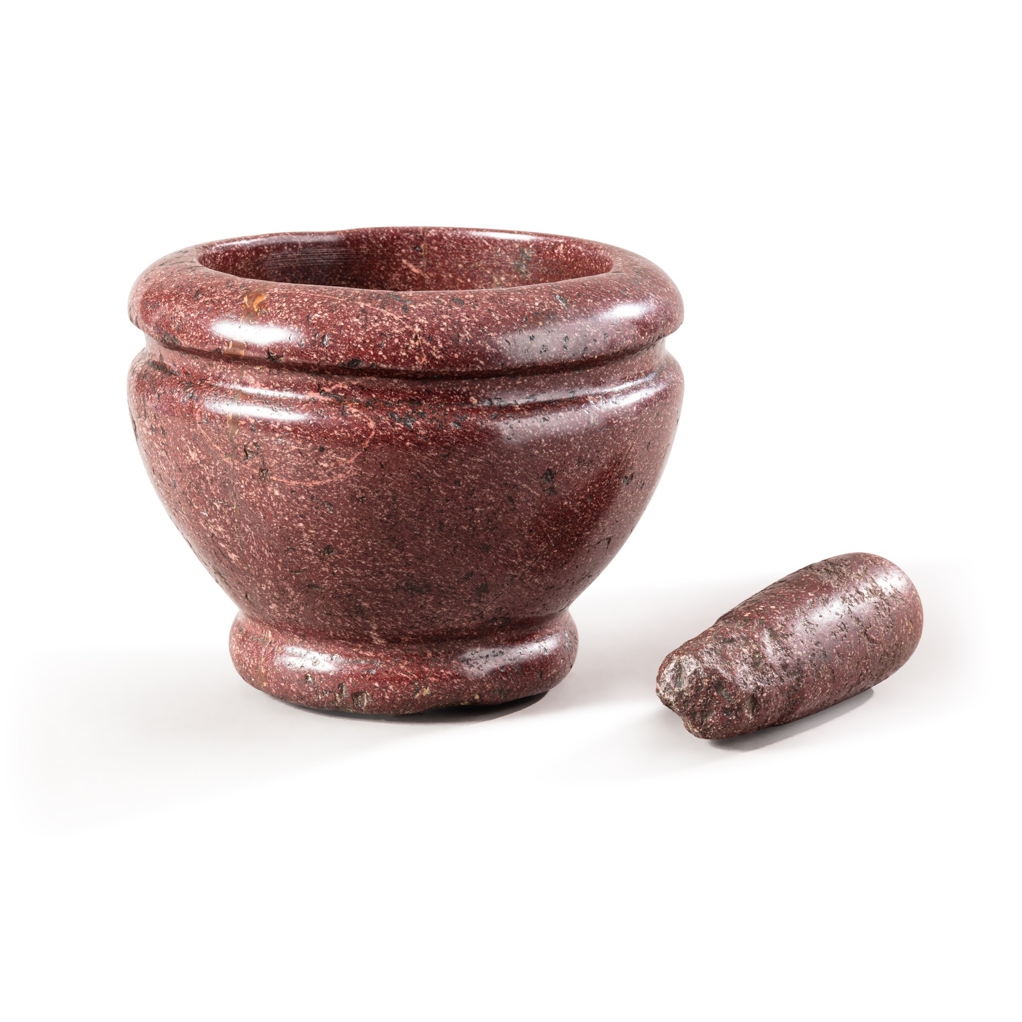 An Egyptian porphyry mortar and pestle, Italy, 17th century Mortier