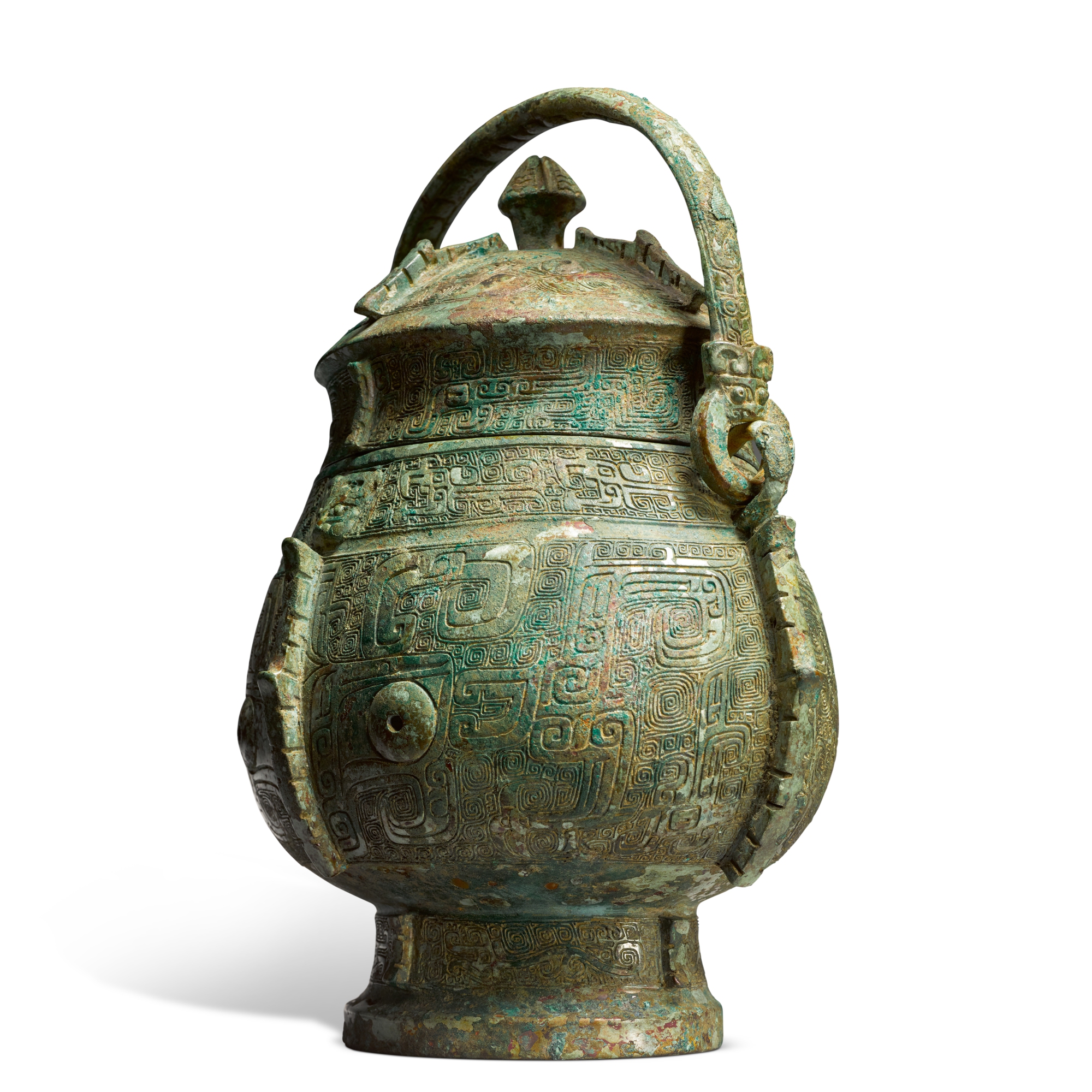 An extremely rare and important archaic bronze ritual wine vessel and ...