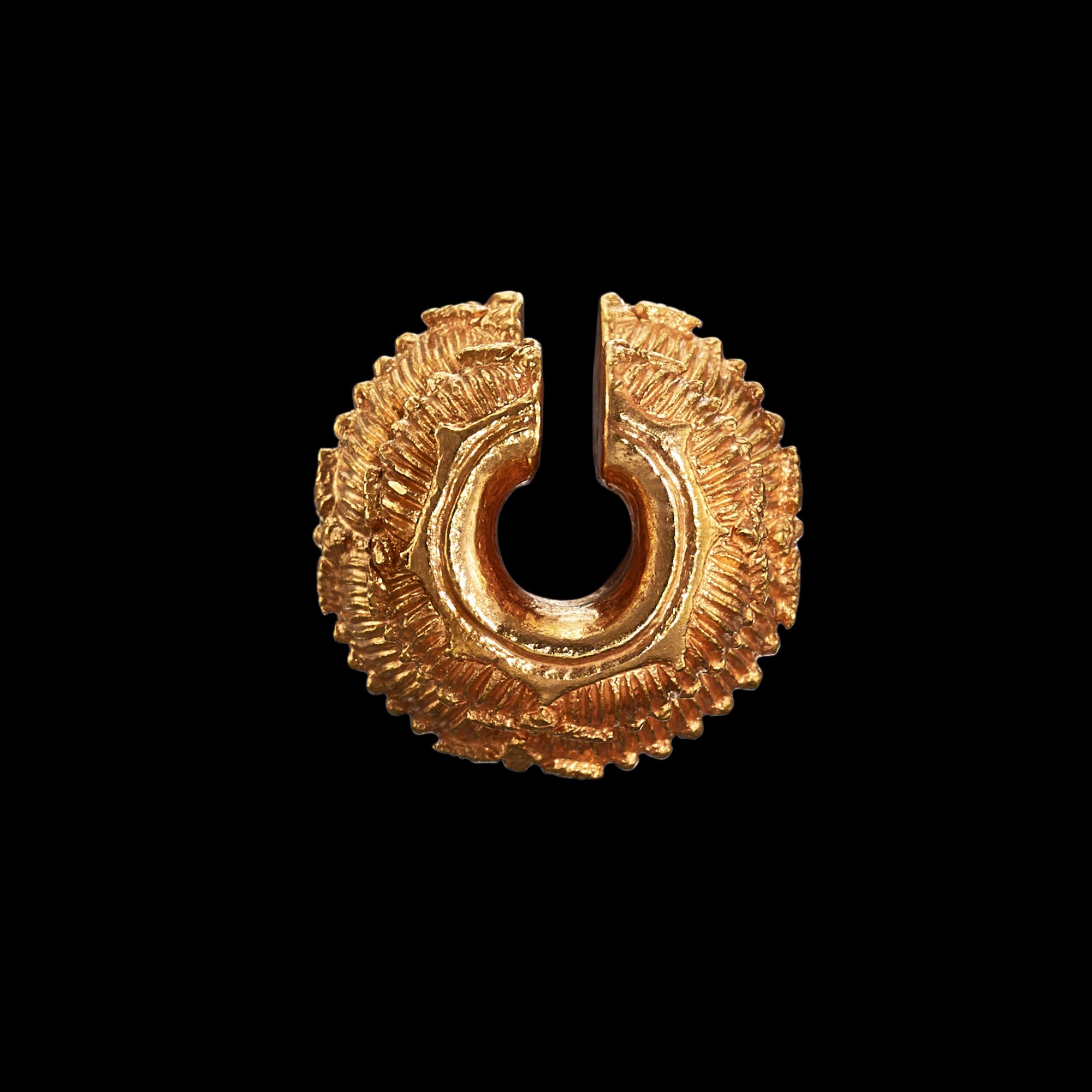 A solid gold cord fastener with chiseled decoration Java, Indonesia ...
