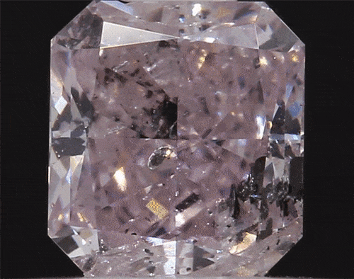 View full screen - View 21 of Lot 23. A Group of Seven Fancy Pink Colored Diamonds.