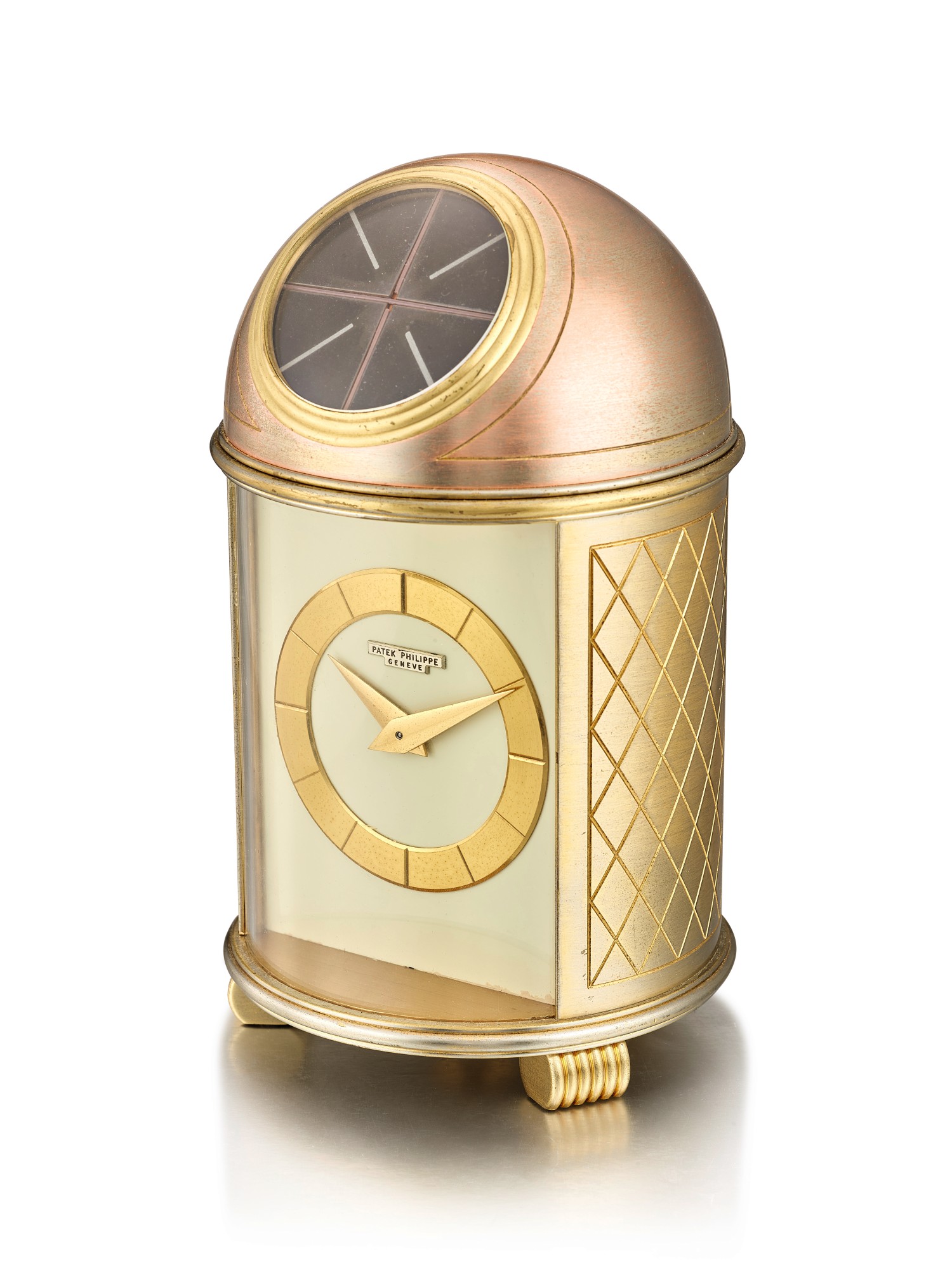 PATEK PHILIPPE REFERENCE 701, A GILT BRASS SOLAR POWERED DOME TABLE