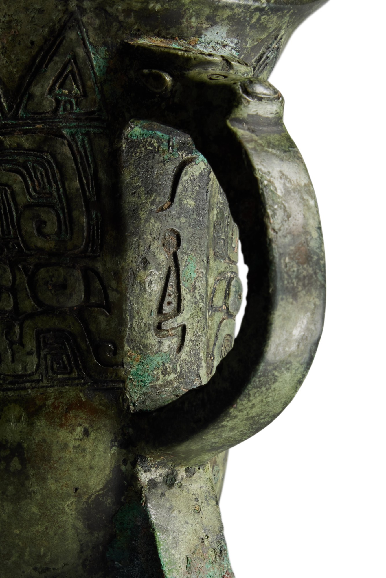 An inscribed archaic bronze ritual wine vessel (Jue), Late Shang ...