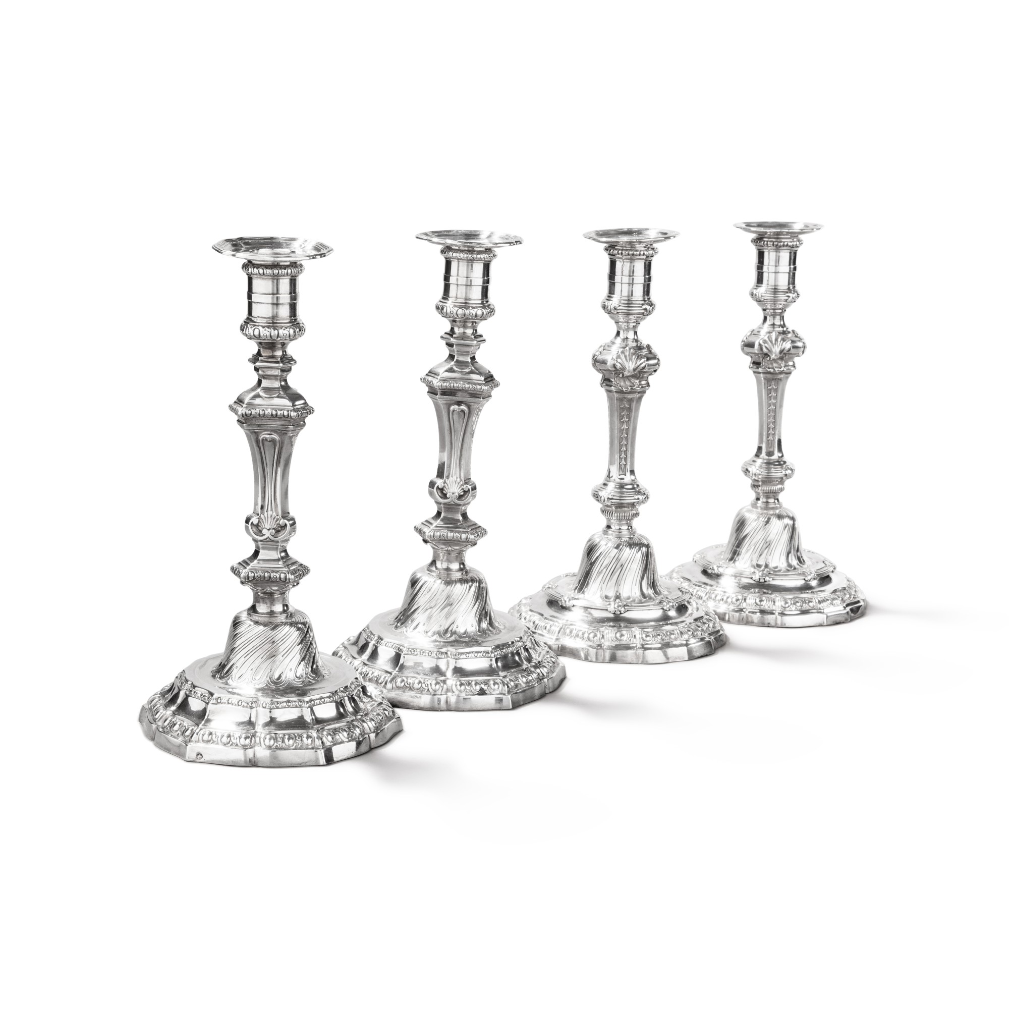 Two pairs of French silver candlesticks, one, Claude Antoine Charvet, Paris, 17671768, the