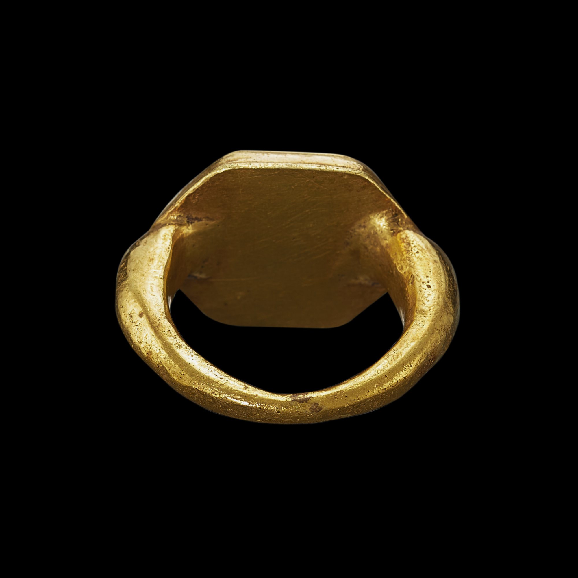 A solid gold ring with hexagonal bezel of a flowerpot, lotus flower and ...