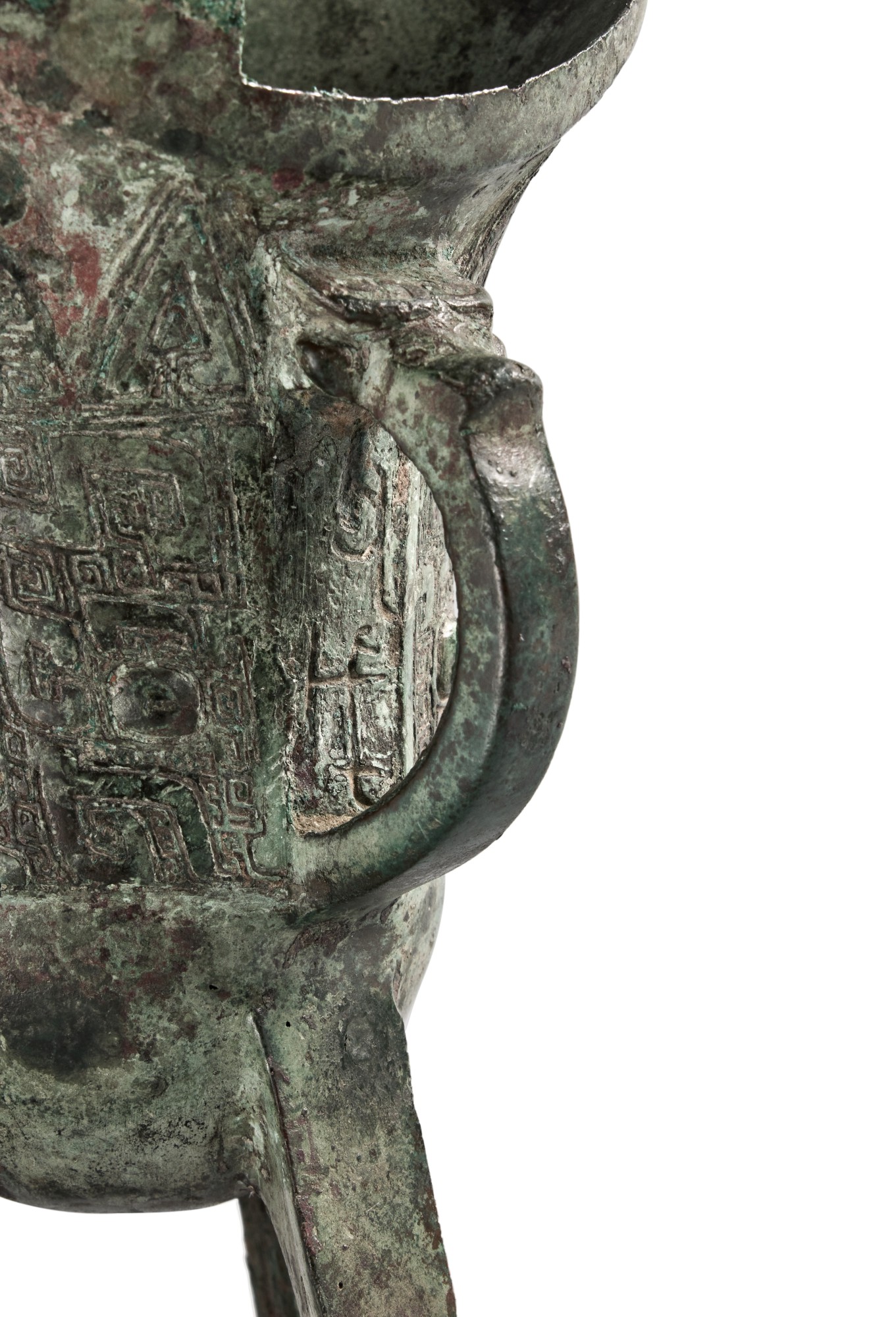 An inscribed archaic bronze ritual wine vessel (Jue), Late Shang ...
