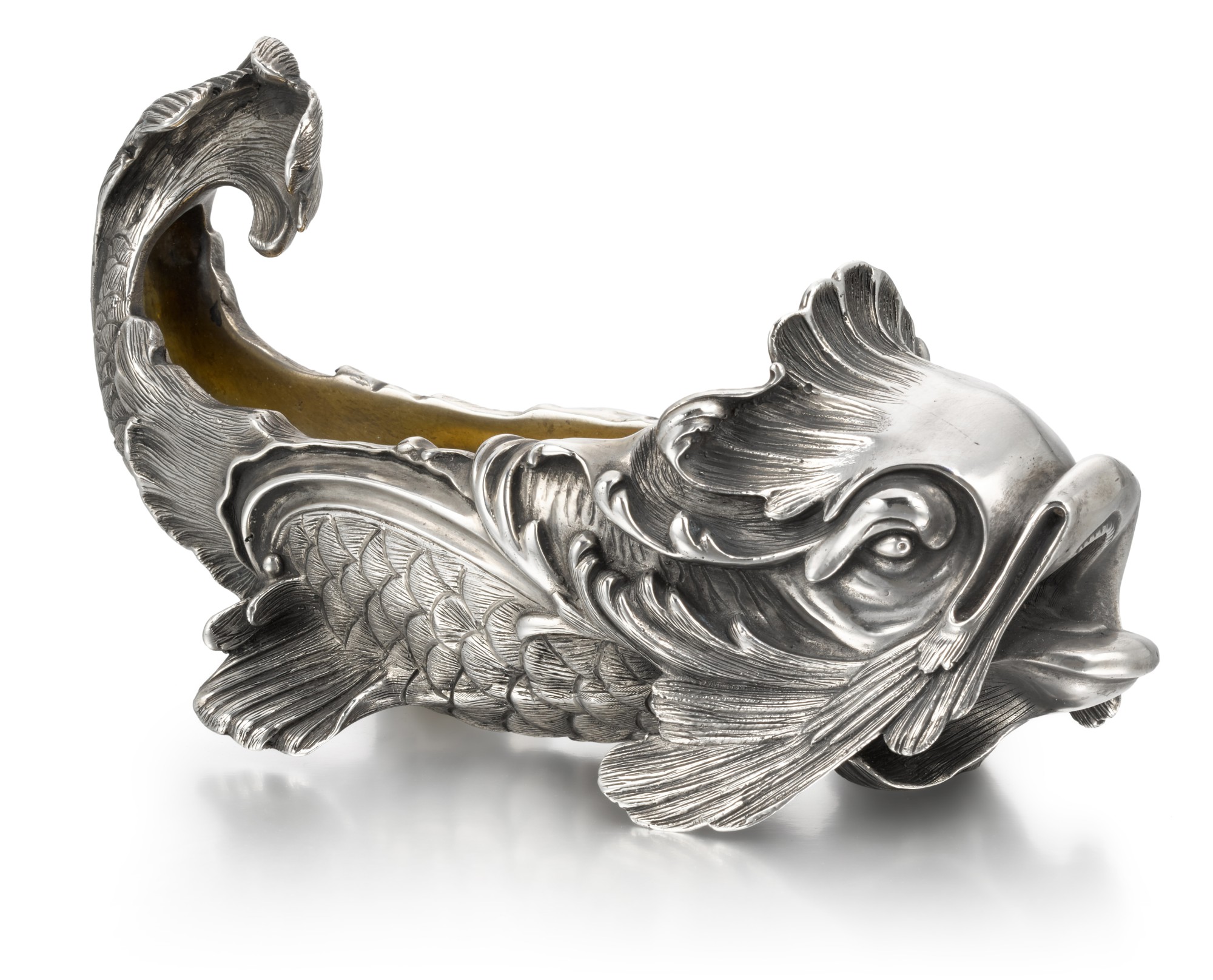 A Fabergé silver salt-cellar in the form of a dolphin, workmaster ...