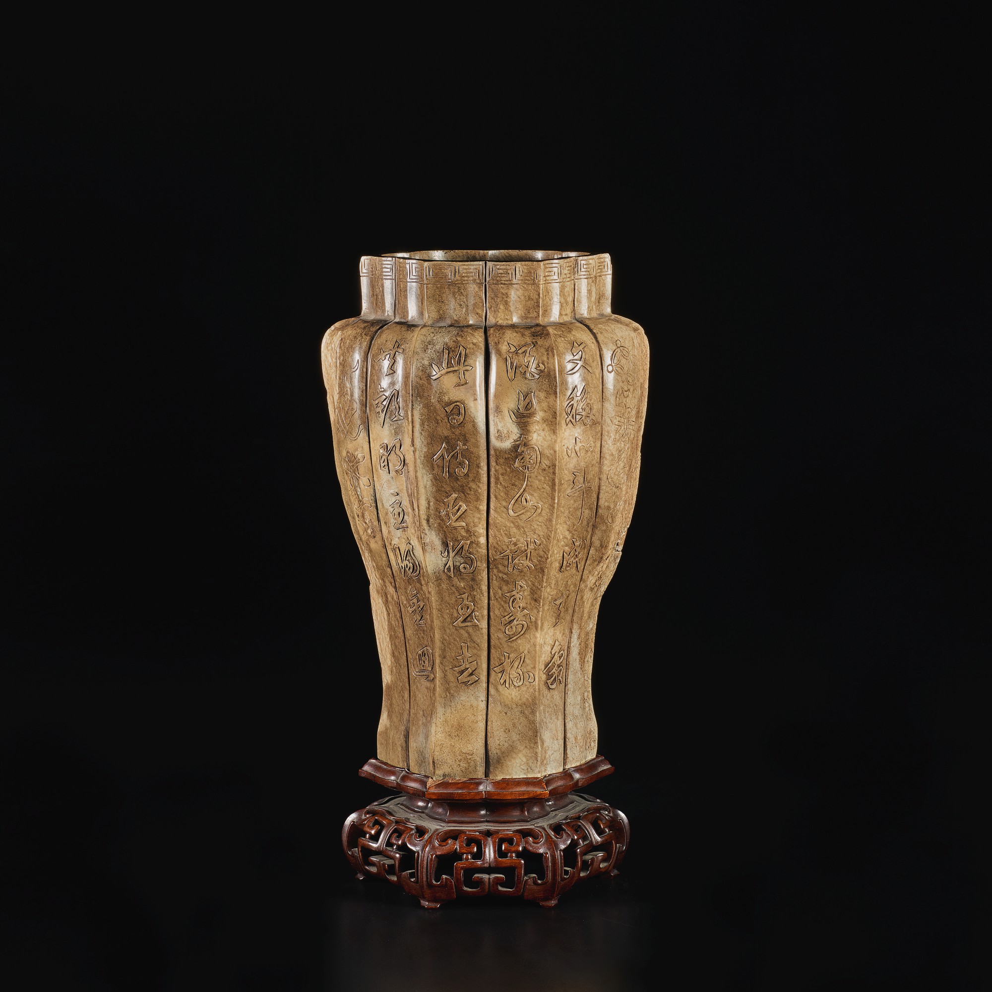A 'CHICKEN BONE' JADE LOBED VASE, LATE MING DYNASTY, 16TH / 17TH