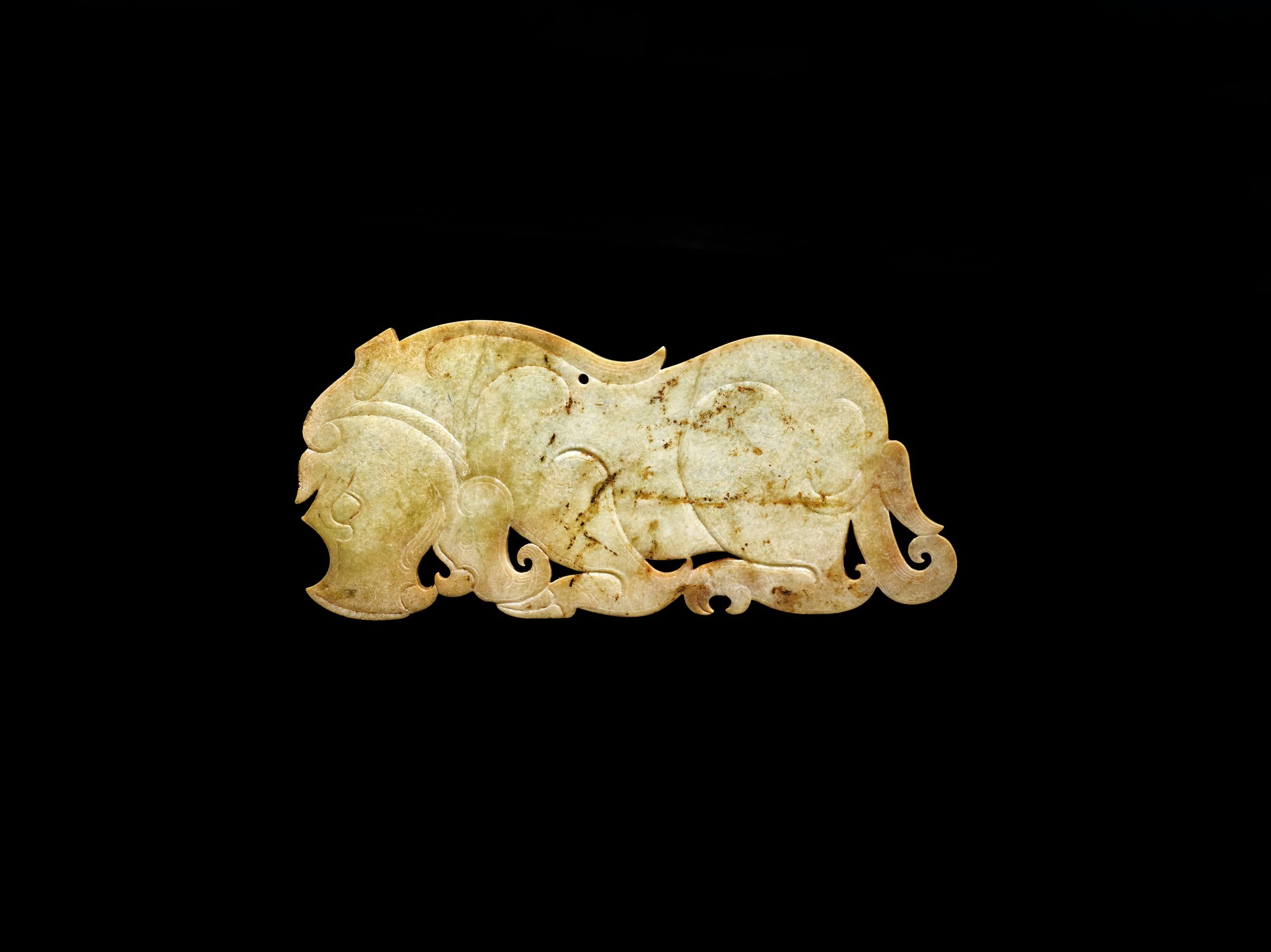 A jade animal-shaped plaque, Late Eastern Zhou - Western Han dynasty ...