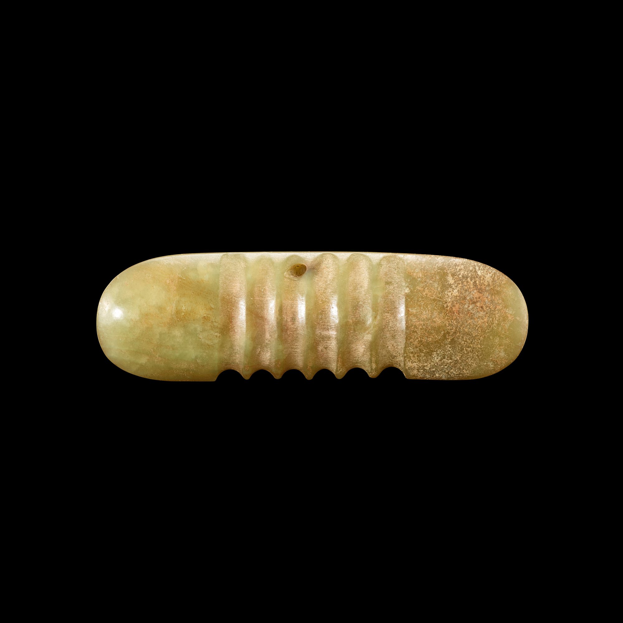 A celadon jade oblong pendant, Neolithic period, Hongshan culture 新石器時代紅山文化 青玉瓦溝紋器 Important