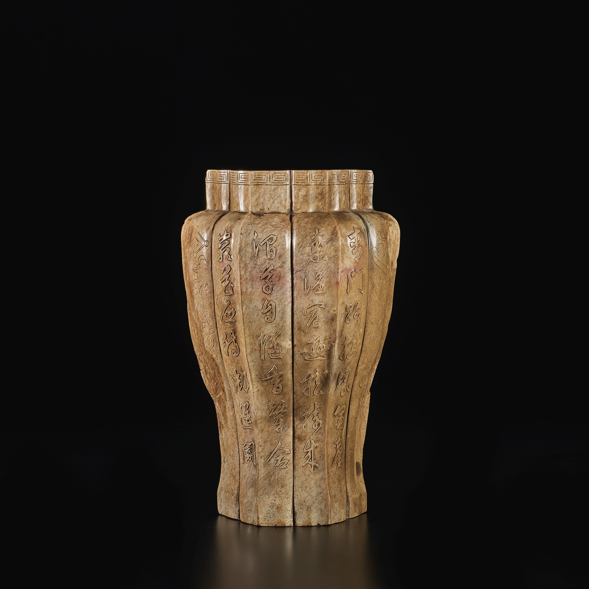 A 'CHICKEN BONE' JADE LOBED VASE, LATE MING DYNASTY, 16TH / 17TH