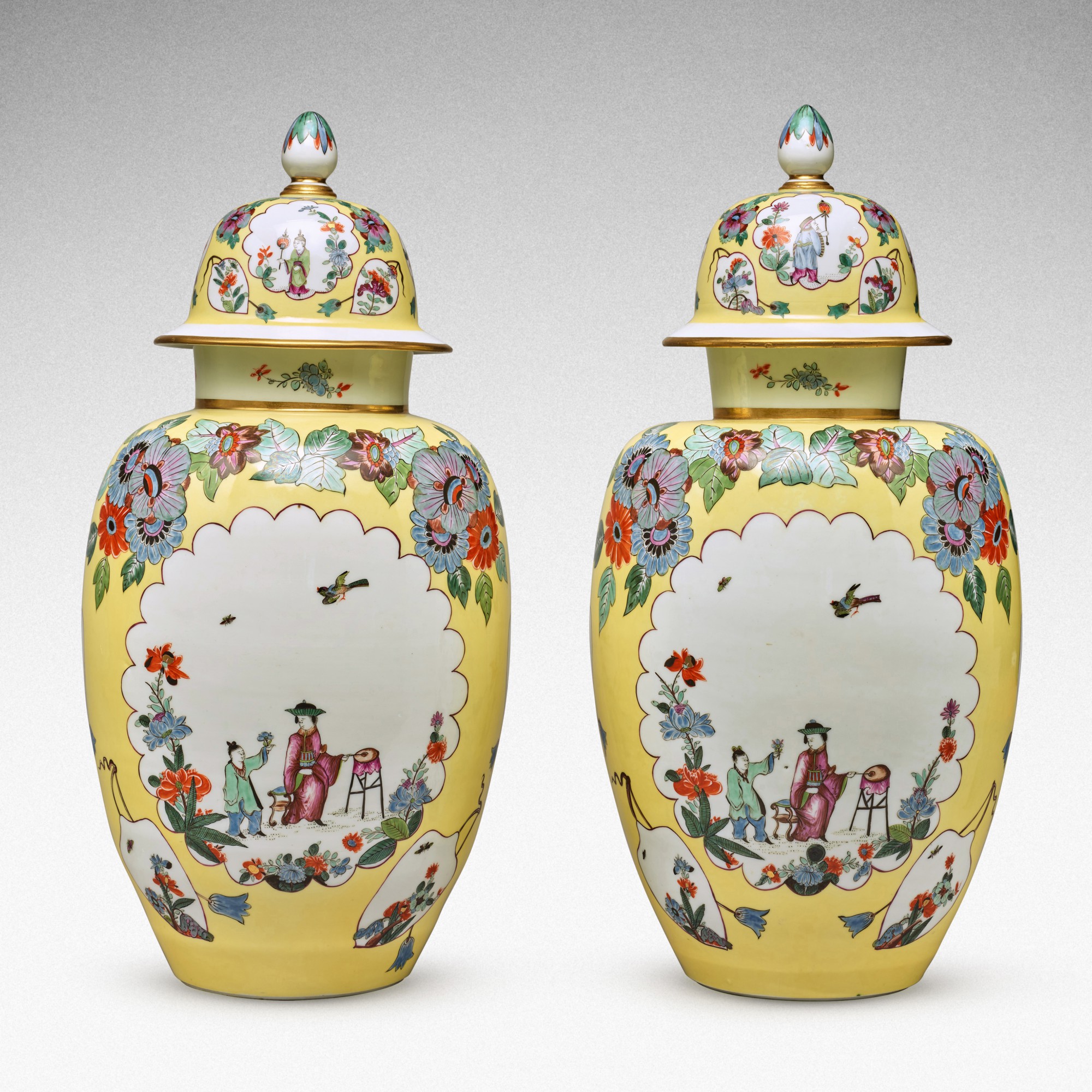A pair of Meissen Augustus Rex yellowground baluster vases and covers