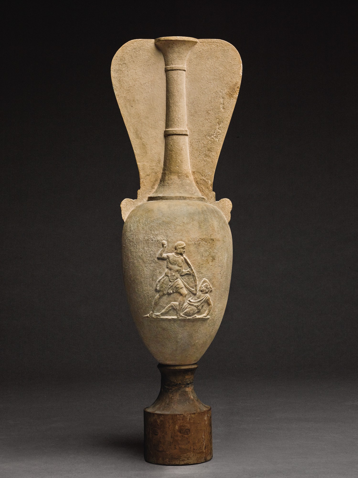 A FRAGMENTARY GREEK MARBLE LOUTROPHOROS INSCRIBED FOR KOLYMBAS, ATTIC