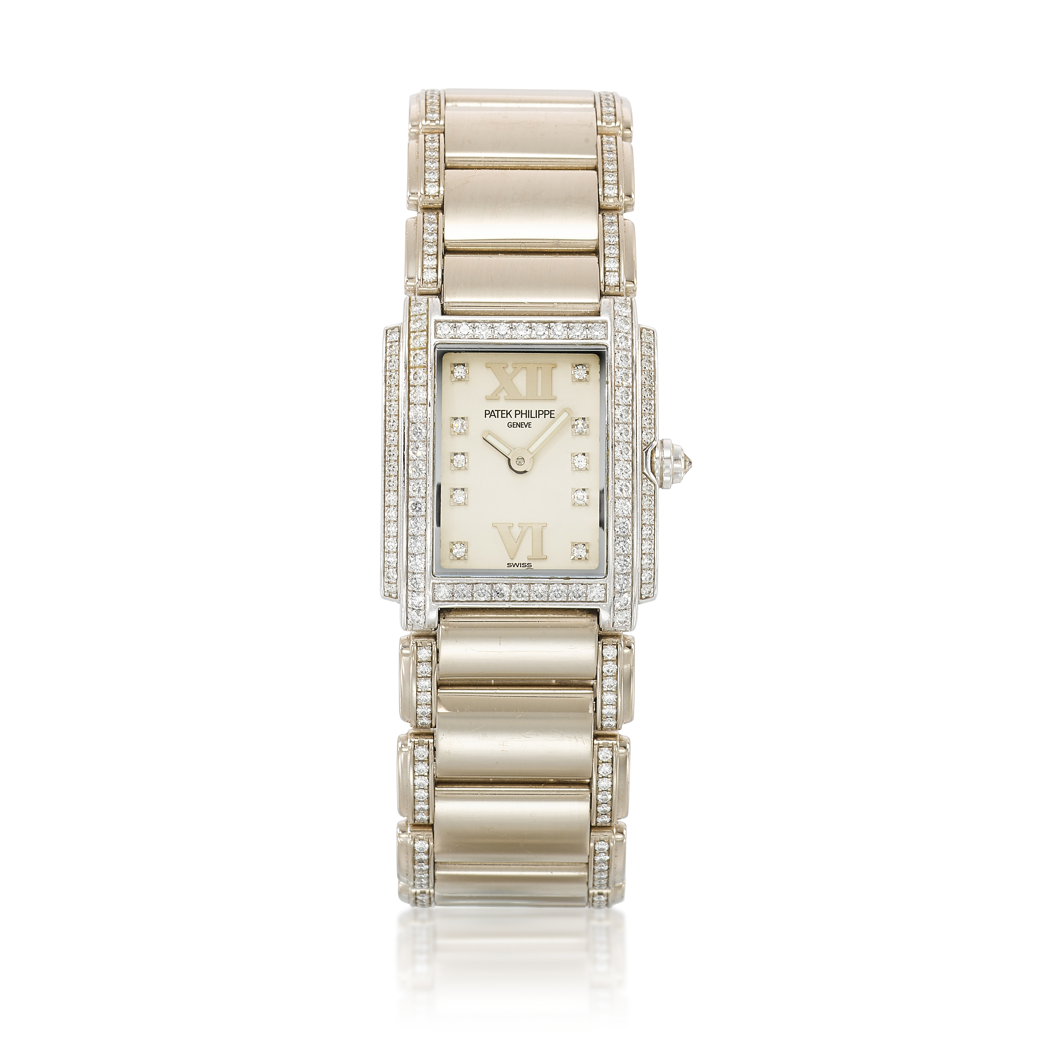Patek Philippe Twenty-4 (Reference 4908G). A 26.3mm White Gold