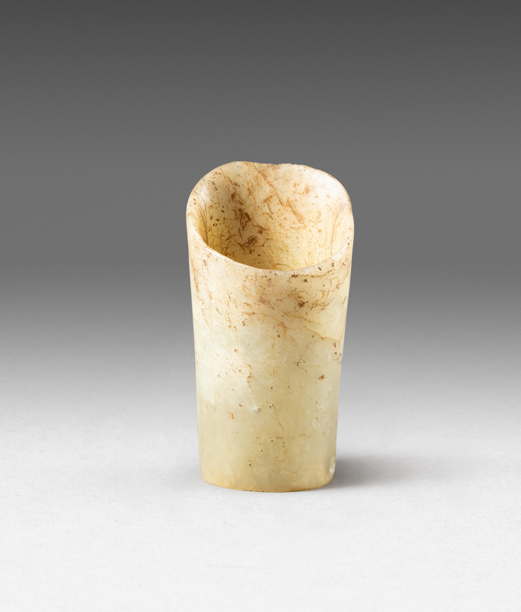 A celadon jade horse-hoof ornament Possibly neolithic | 或為新石器時代 玉馬蹄形器 ...