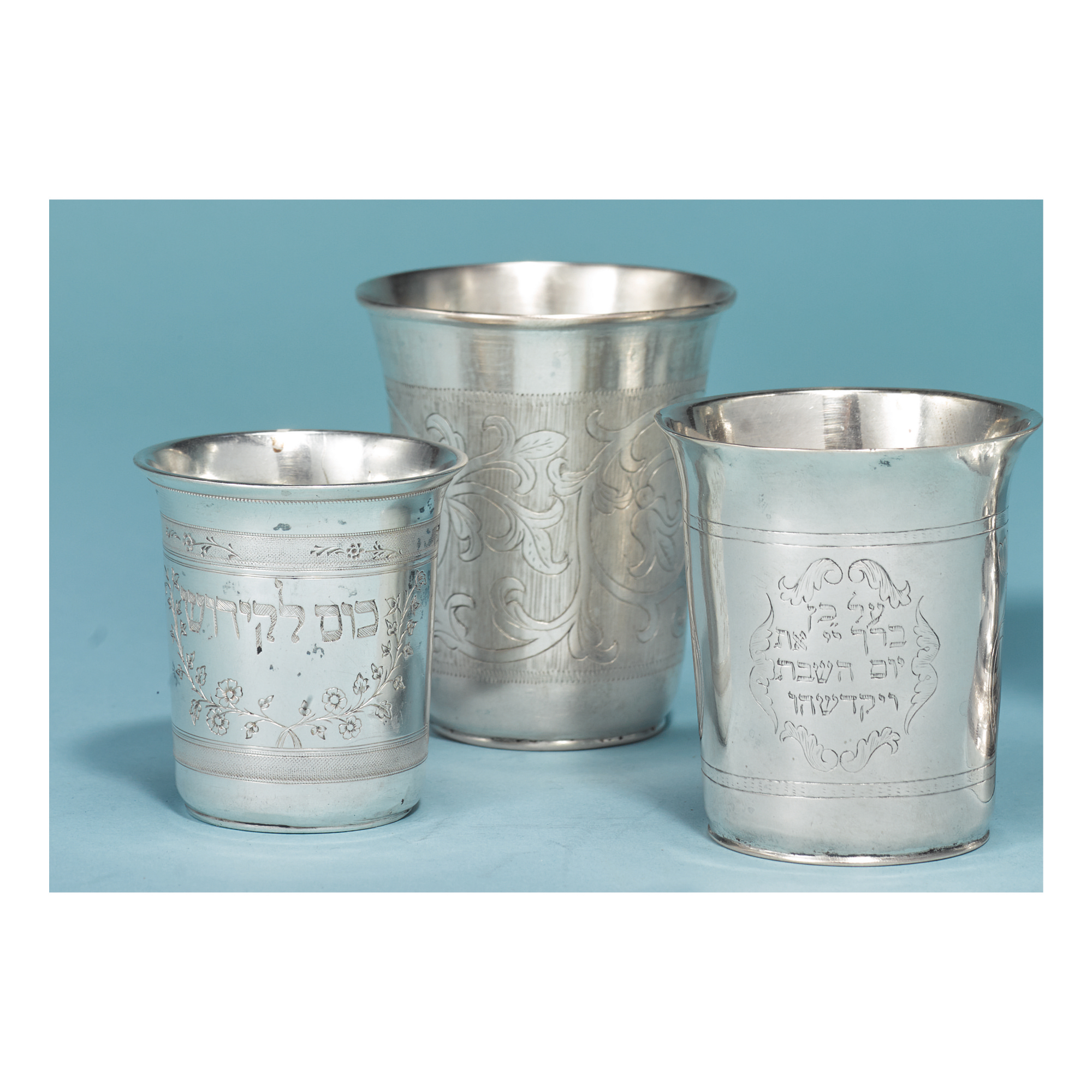 THREE POLISH SILVER KIDDUSH CUPS, MID 19TH CENTURY Important Judaica