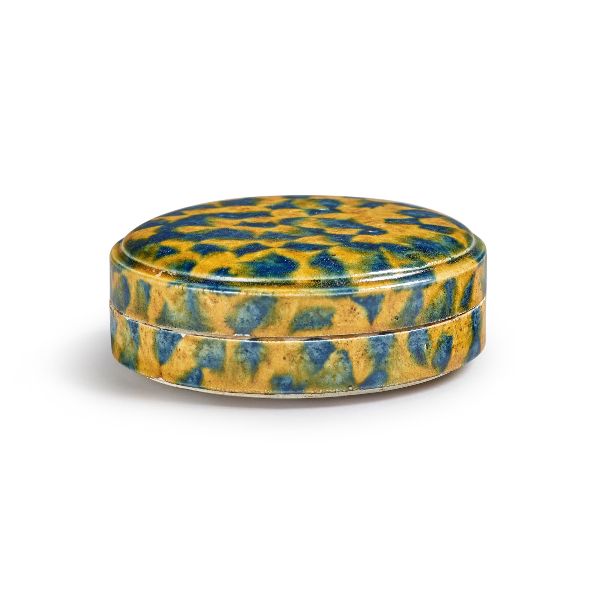 A dappled blueandamberglazed box and cover, Tang dynasty 唐 三彩加藍蓋盒