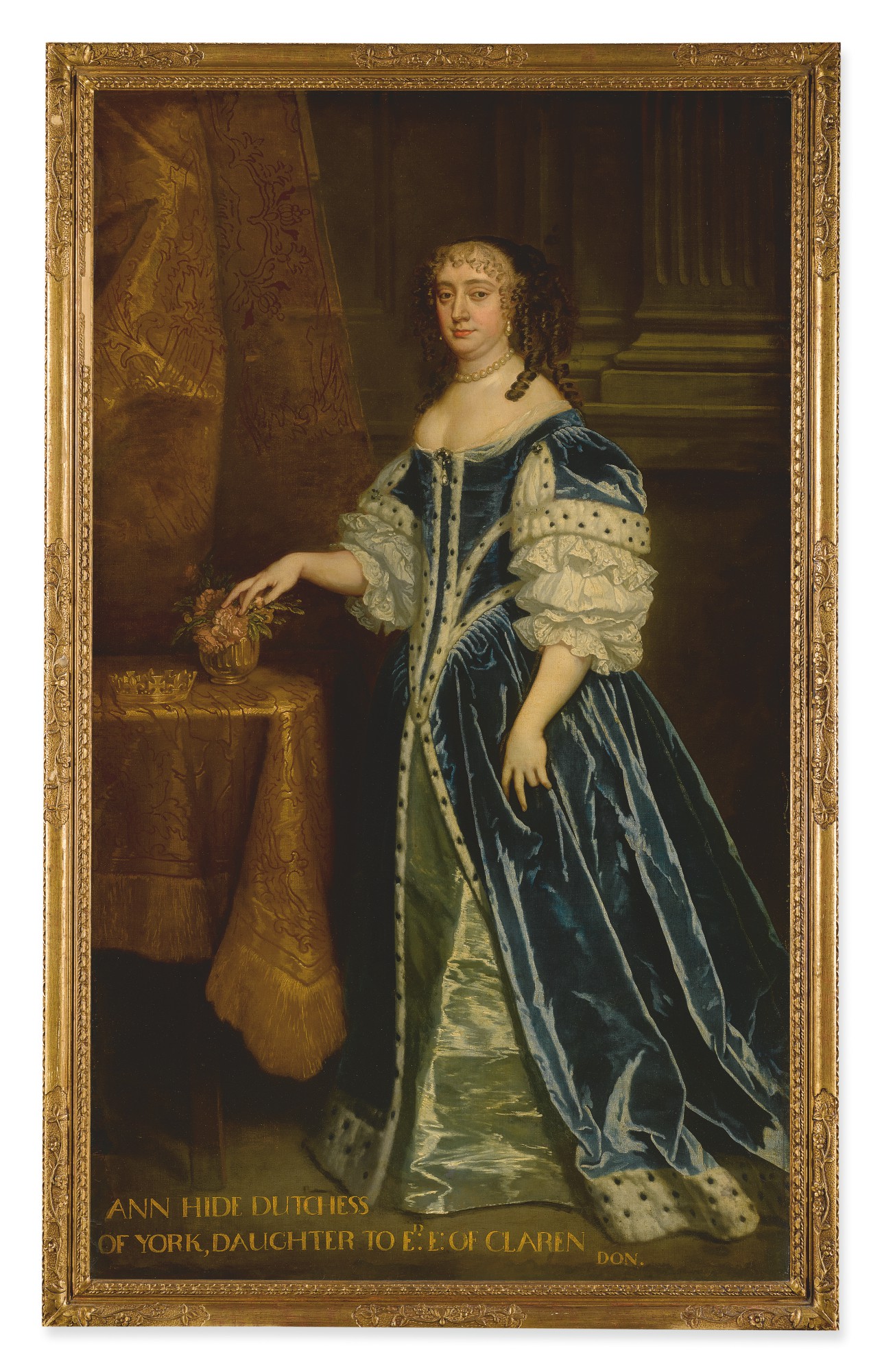 STUDIO OF SIR PETER LELY | PORTRAIT OF ANNE HYDE, DUCHESS OF YORK AND ALBANY (1637-1671), FULL-LENGTH, IN A BLUE GOWN TRIMMED WITH ERMINE, STANDING BEFORE A GOLD CURTAIN WITH HER CROWN ON A TABLE