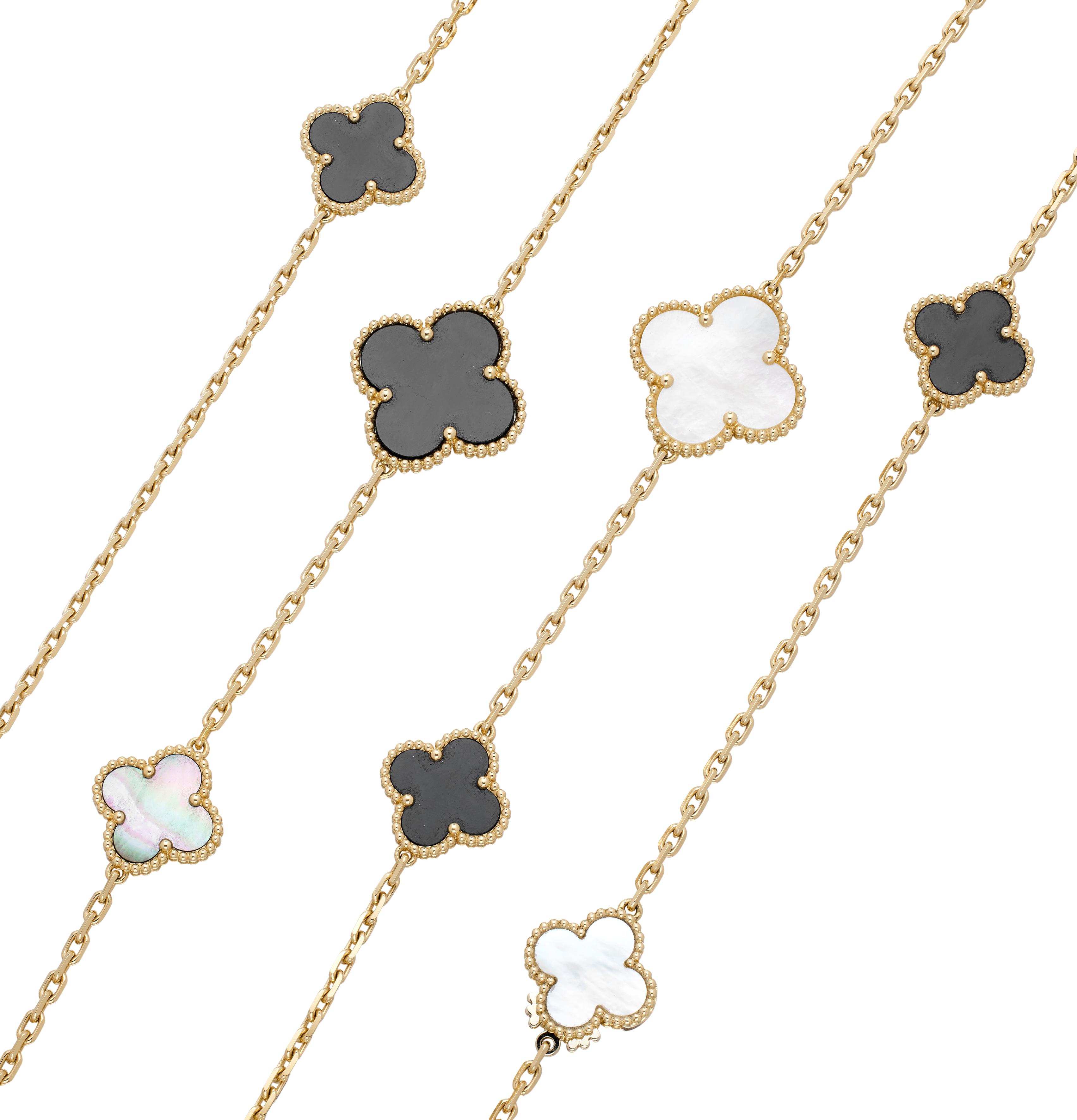 Van Cleef & Arpels Gold, Mother Of Pearl And Onyx Magic Alhambra