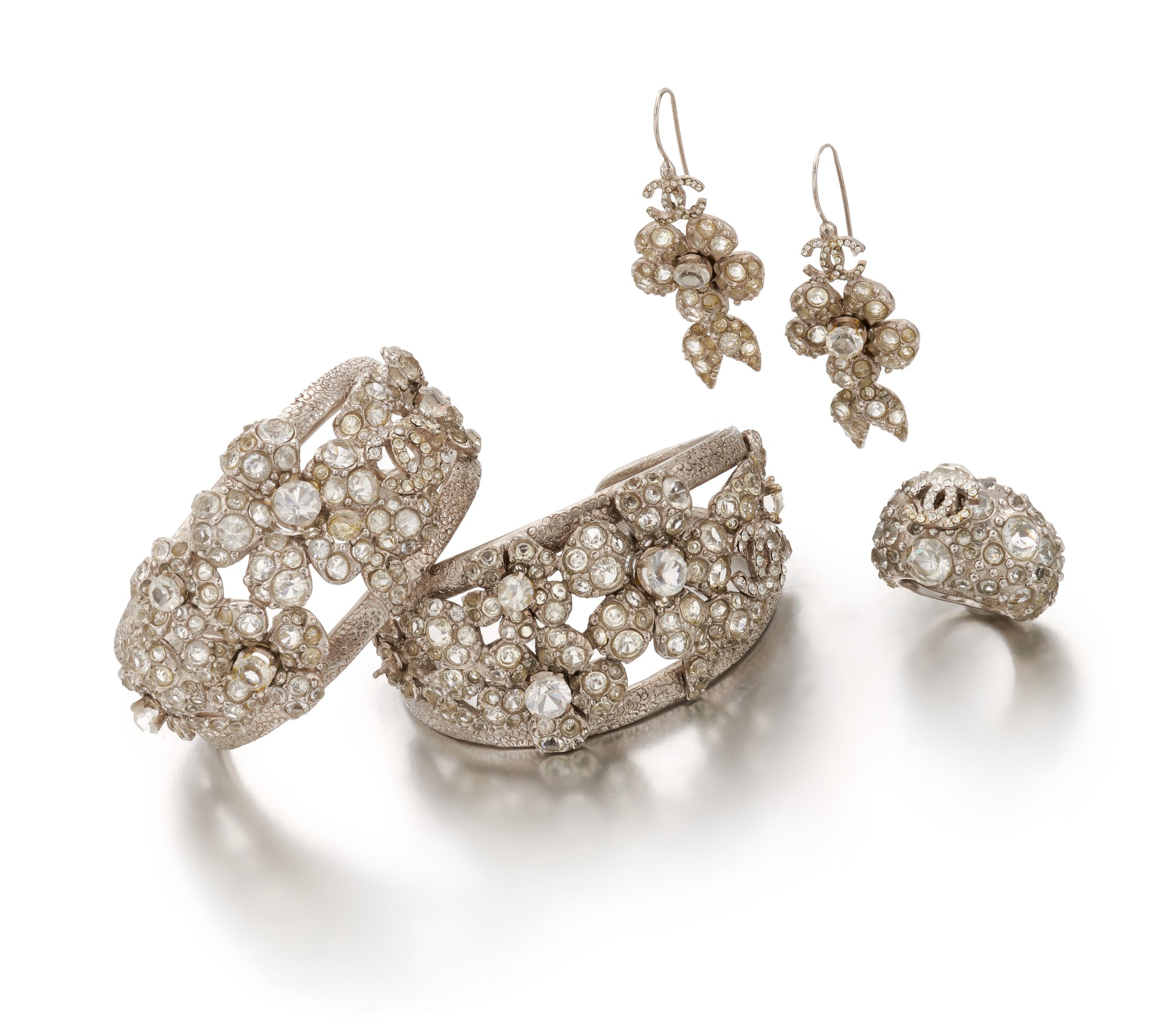 Collection of crystal 'Camellia' jewellery Chanel Handbags and