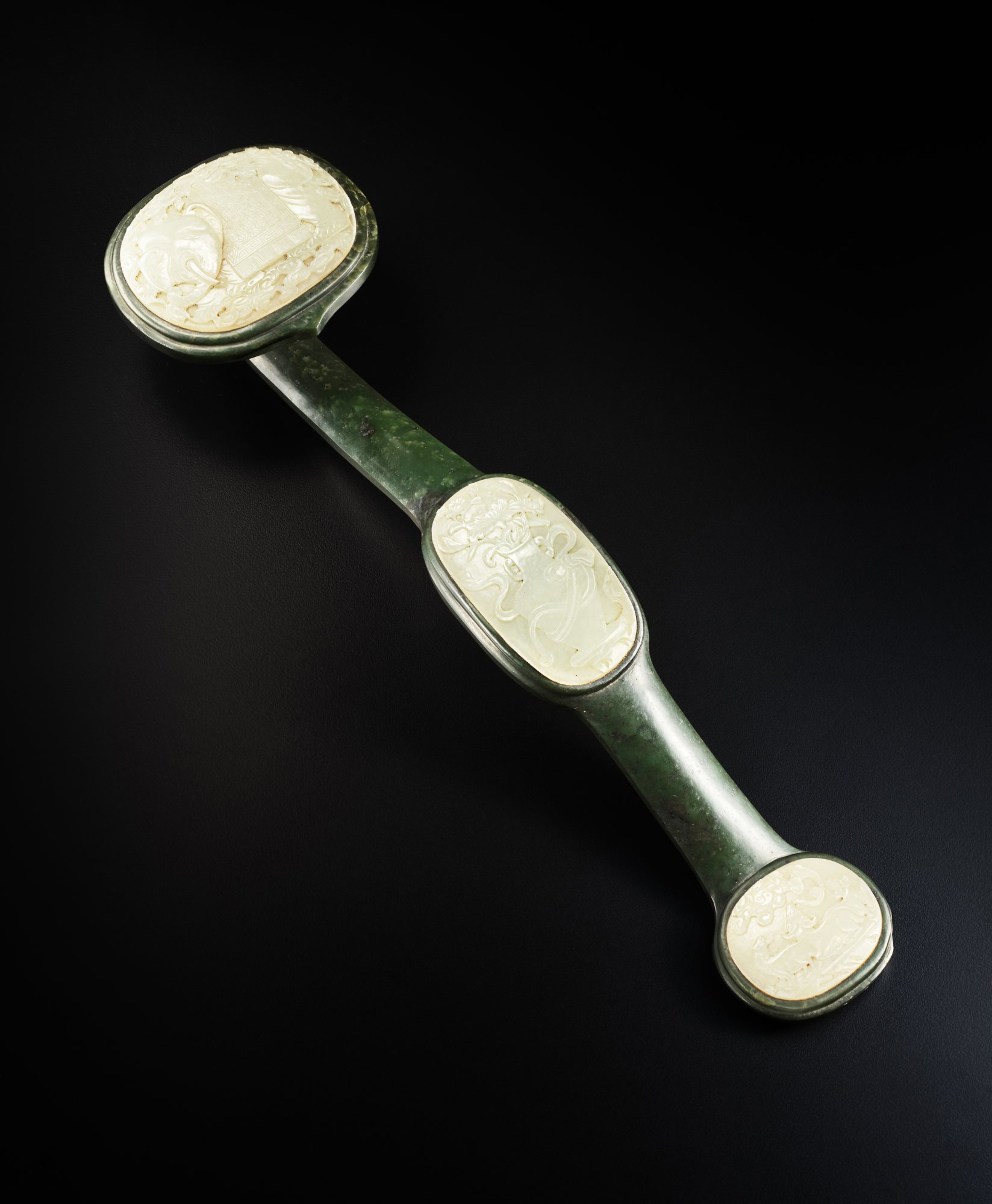 A white jade-inset spinach-green jade ruyi scepter, Qing dynasty, 19th ...