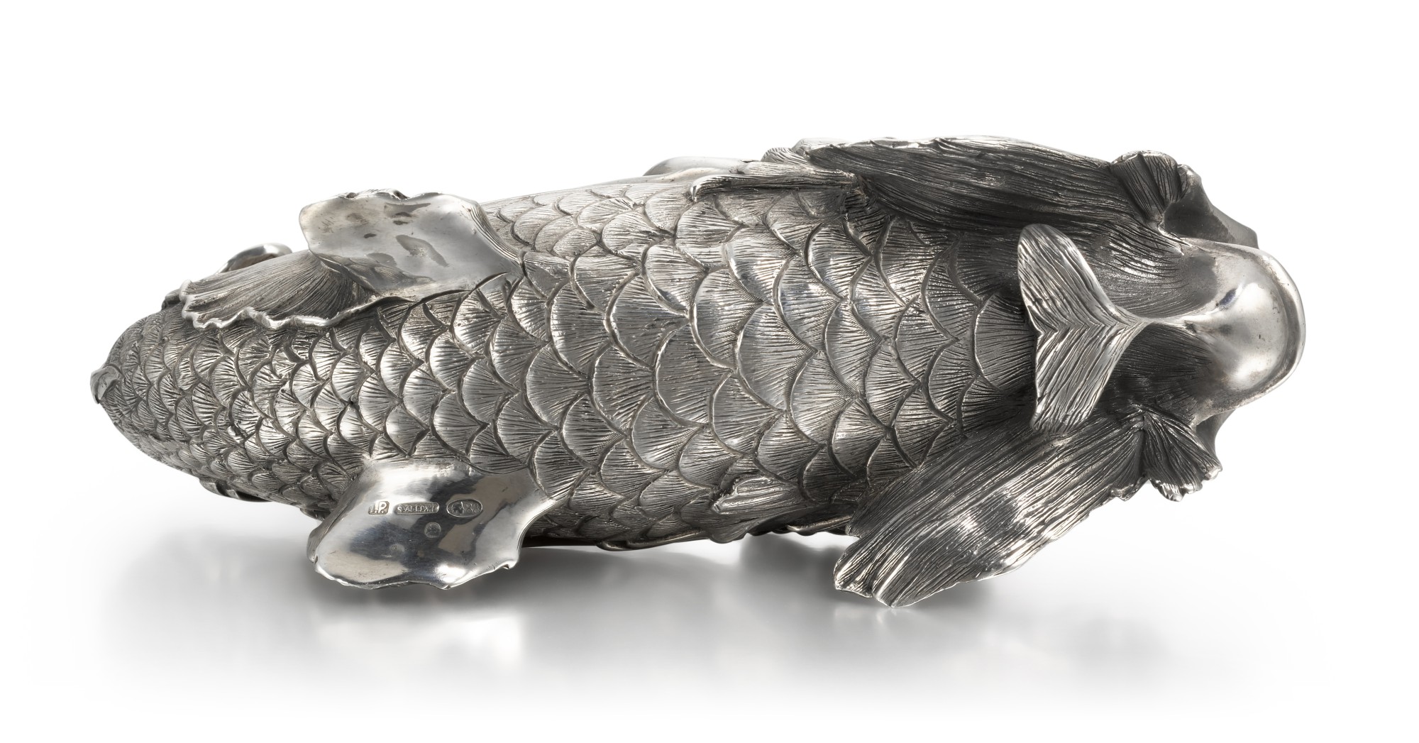 A Fabergé silver salt-cellar in the form of a dolphin, workmaster ...