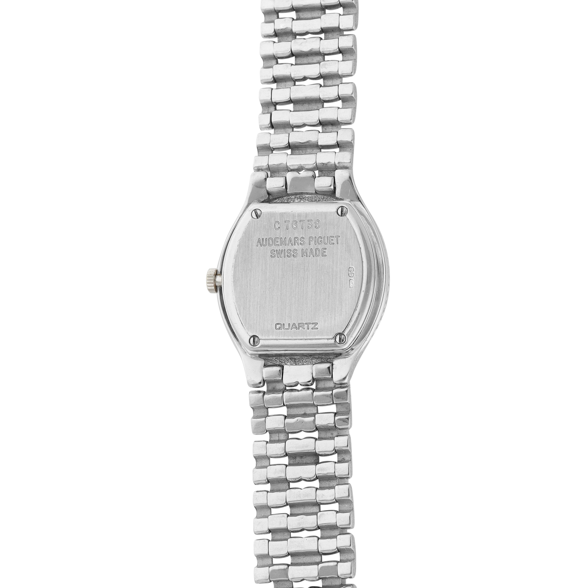 Audemars Piguet. A white gold, diamond and sapphire-set bracelet watch. 1990 - Image 3