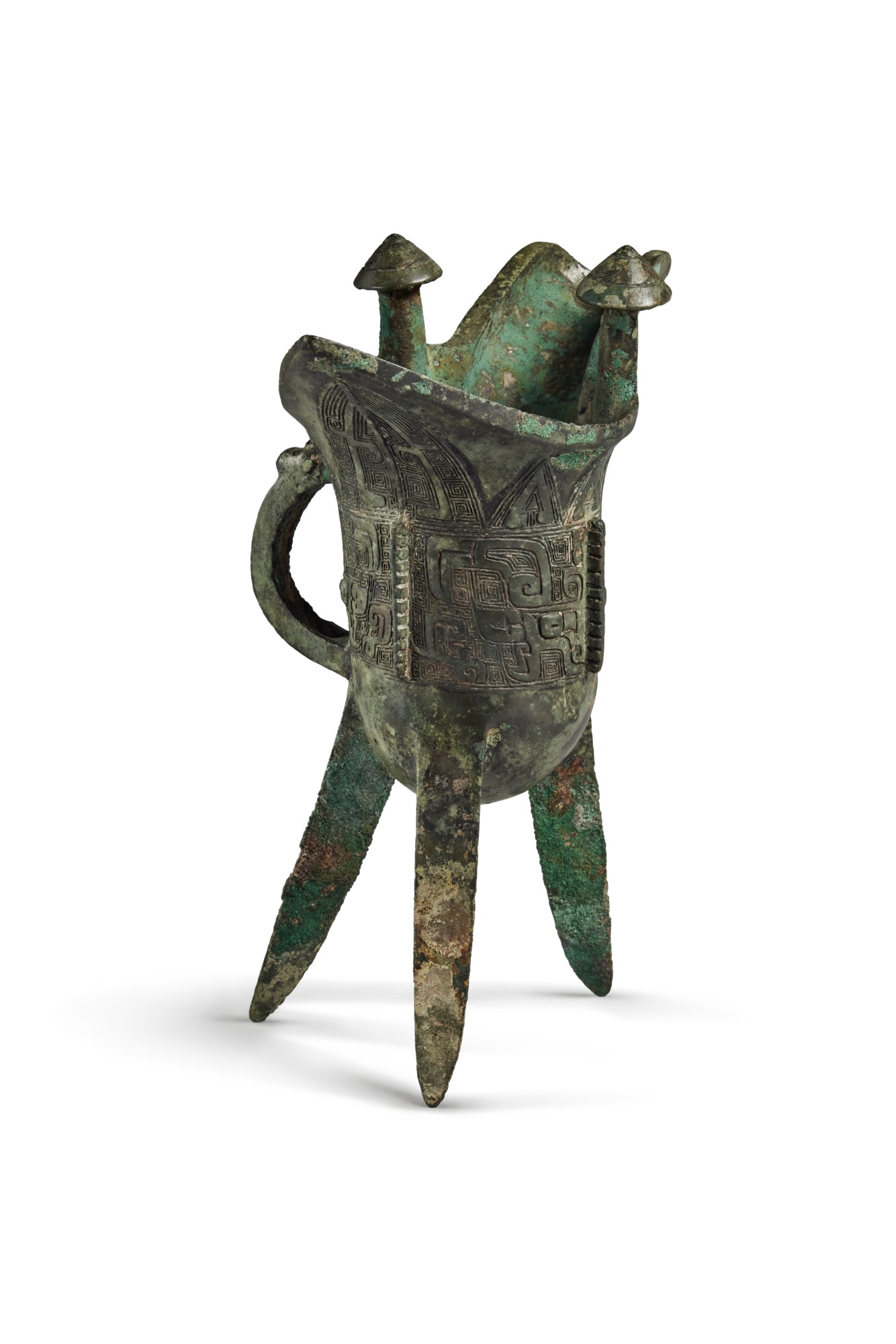 An inscribed archaic bronze ritual wine vessel (Jue), Late Shang ...