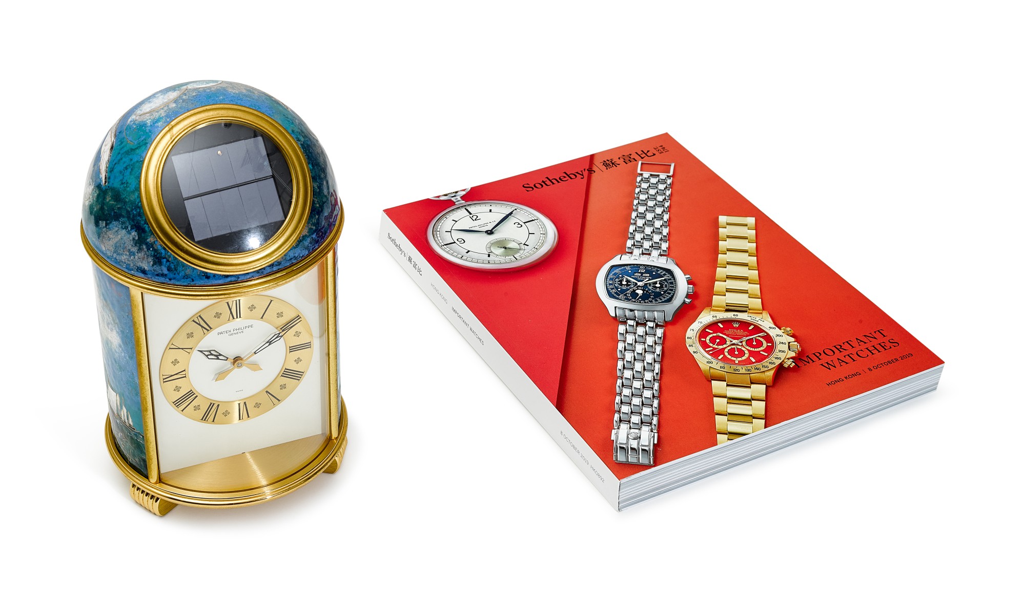 PATEK PHILIPPE REFERENCE 1177M, A UNIQUE GILT BRASS SOLAR POWERED