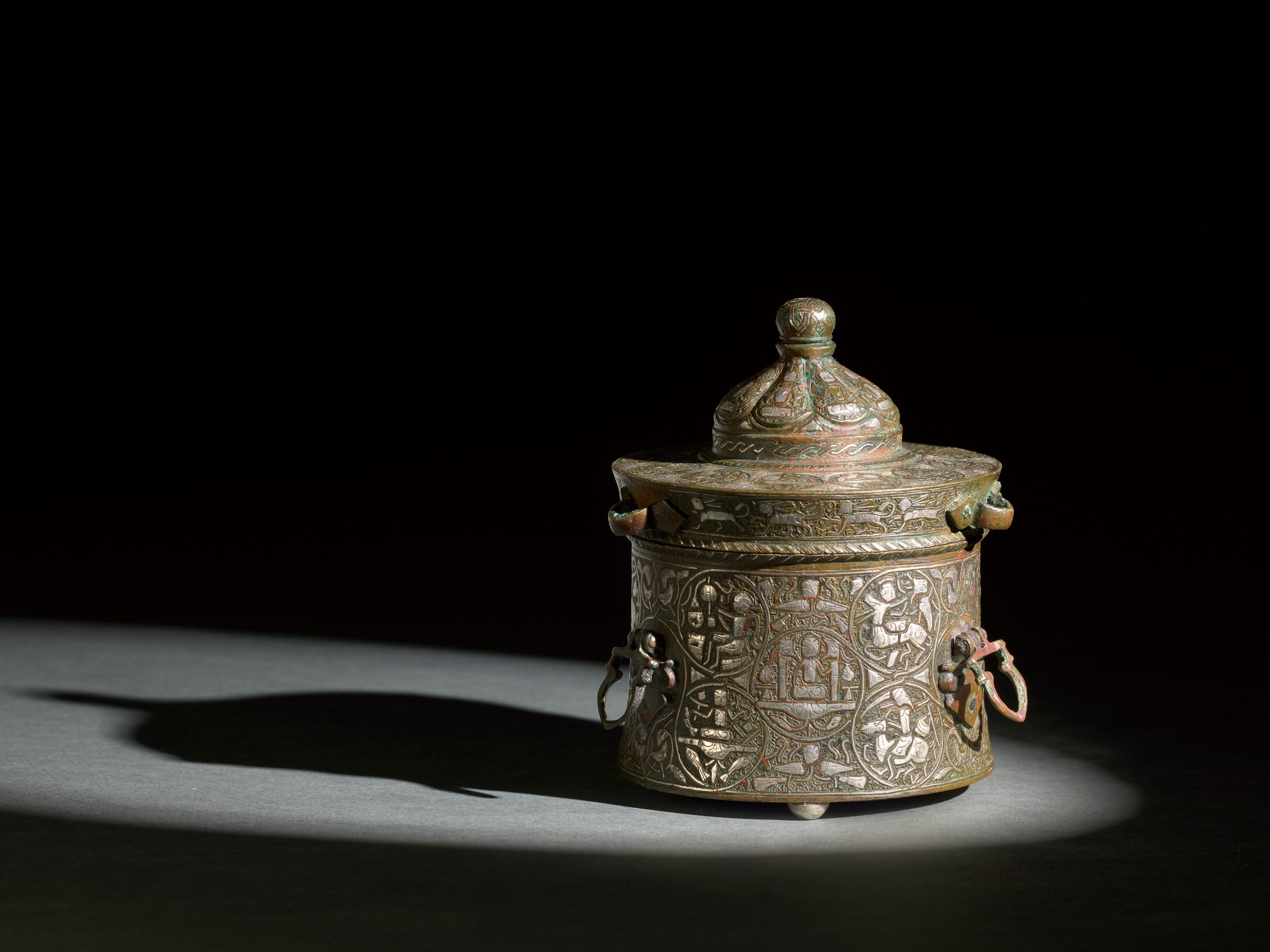 An exceptional Khurasan silver-inlaid bronze inkwell, probably Herat ...