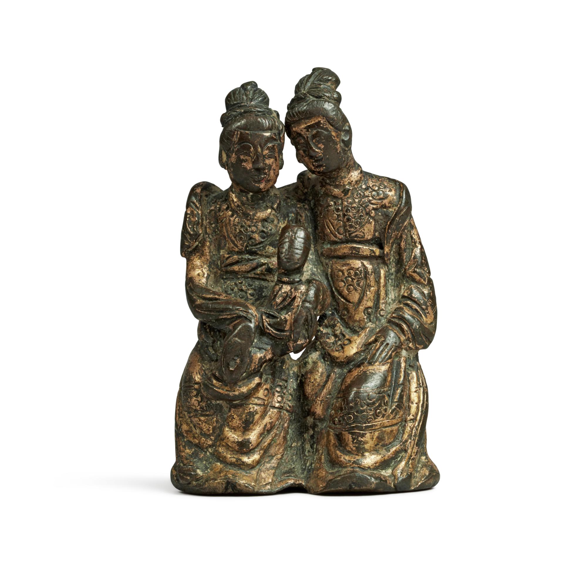 A giltbronze group of two ladies and a child, Ming dynasty 明 銅鎏金仕女擺件