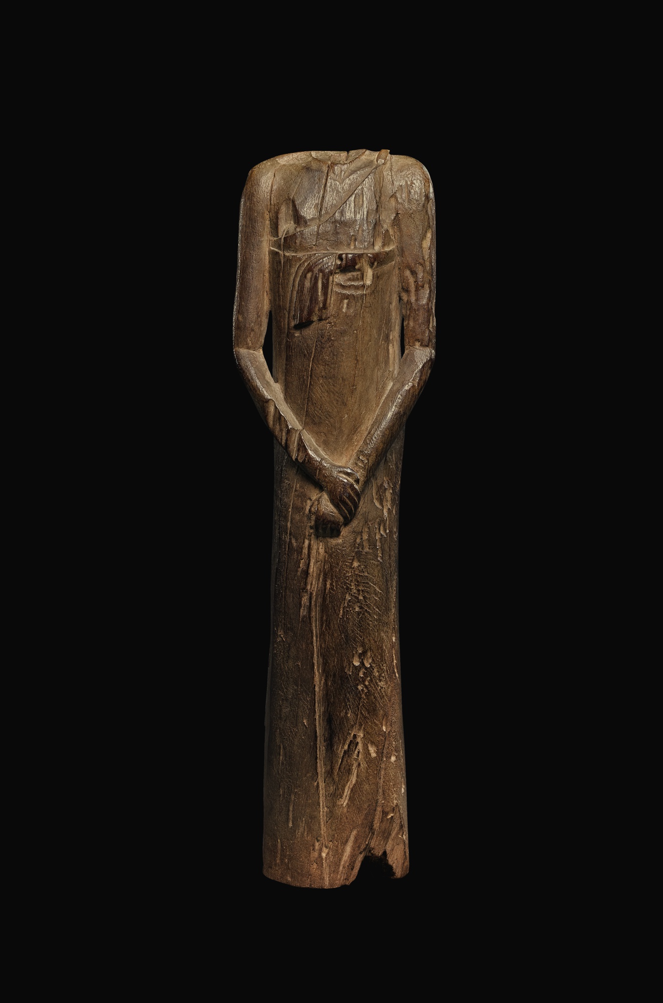 AN EGYPTIAN WOOD FIGURE OF A MAN, SECOND PERSIAN PERIOD, 342332 B.C