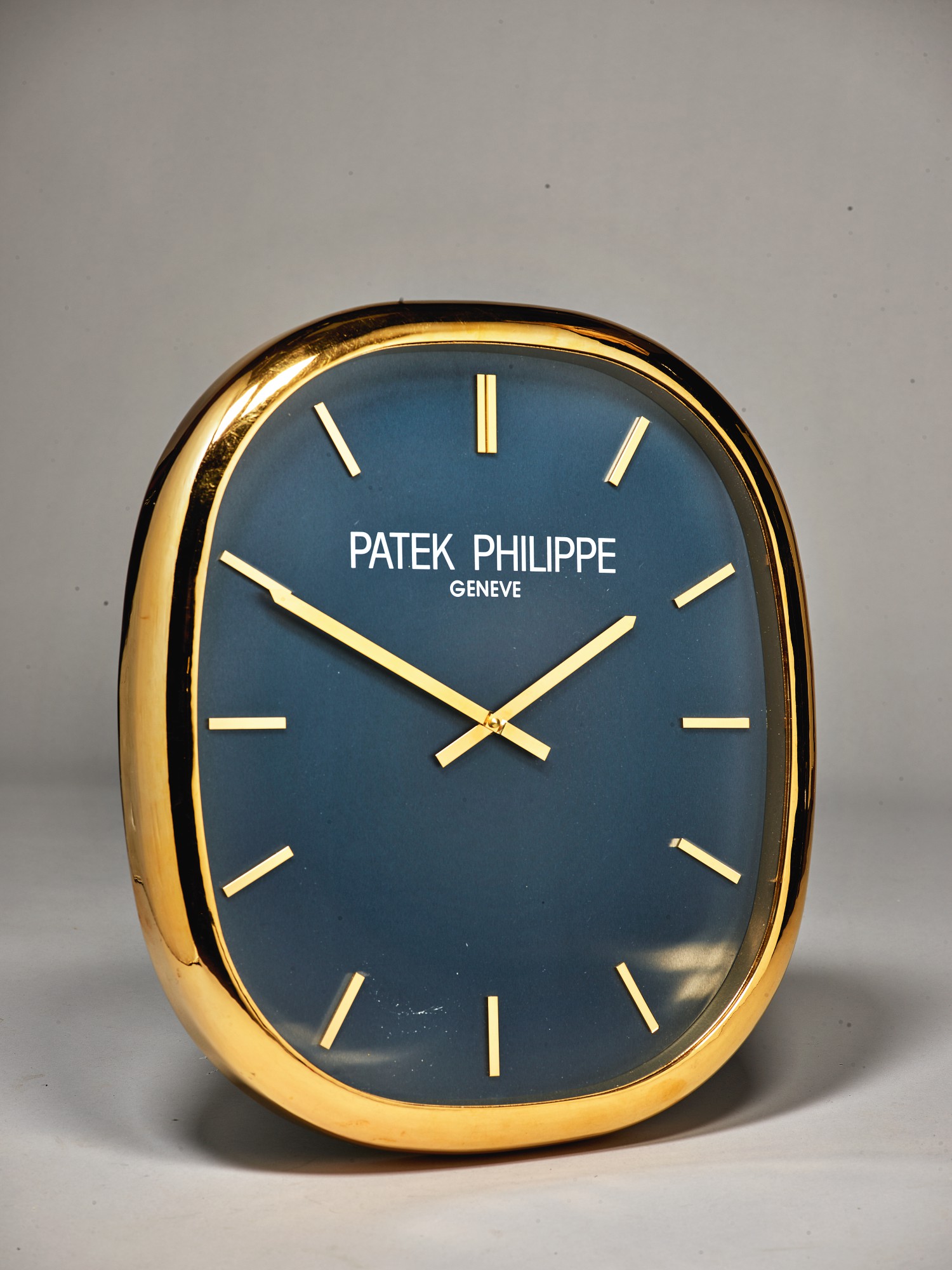 PATEK PHILIPPE ELLIPSE A LARGE OVAL WALL CLOCK, CIRCA 1990