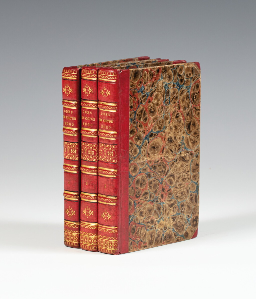 View full screen - View 1 of Lot 73. HUGO. Odes. – Odes et ballades. Paris, Bruxelles, 1827. 3 volumes in-12, demi-veau cerise de l'époque..
