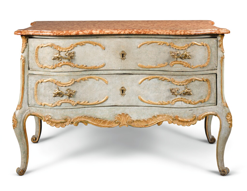 View full screen - View 1 of Lot 19. A SOUTH GERMAN CARVED, PARCEL-GILT AND PAINTED COMMODE.