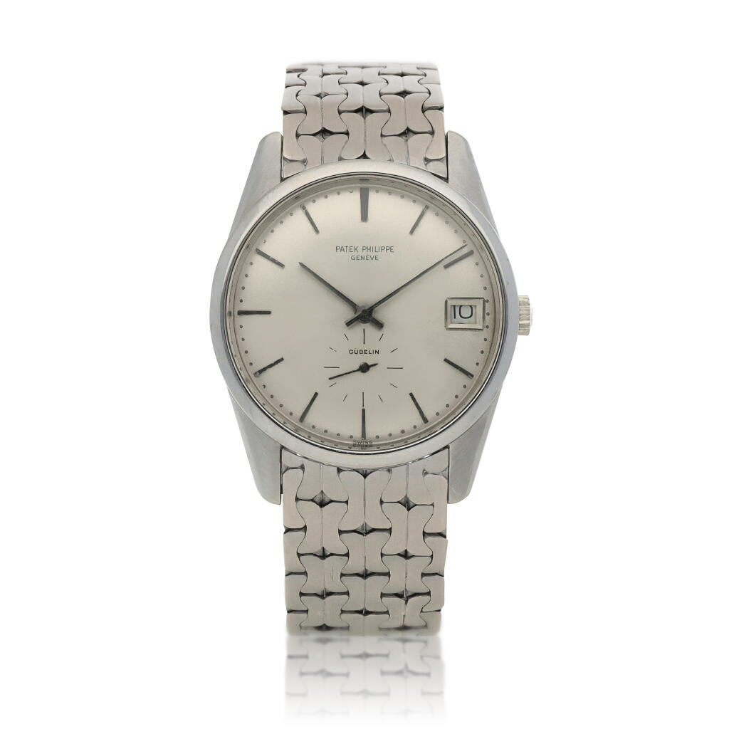 View full screen - View 1 of Lot 26. Retailed by Gübelin: Calatrava, Ref. 3558 White gold wristwatch with date and associated Gübelin bracelet Circa 1970.